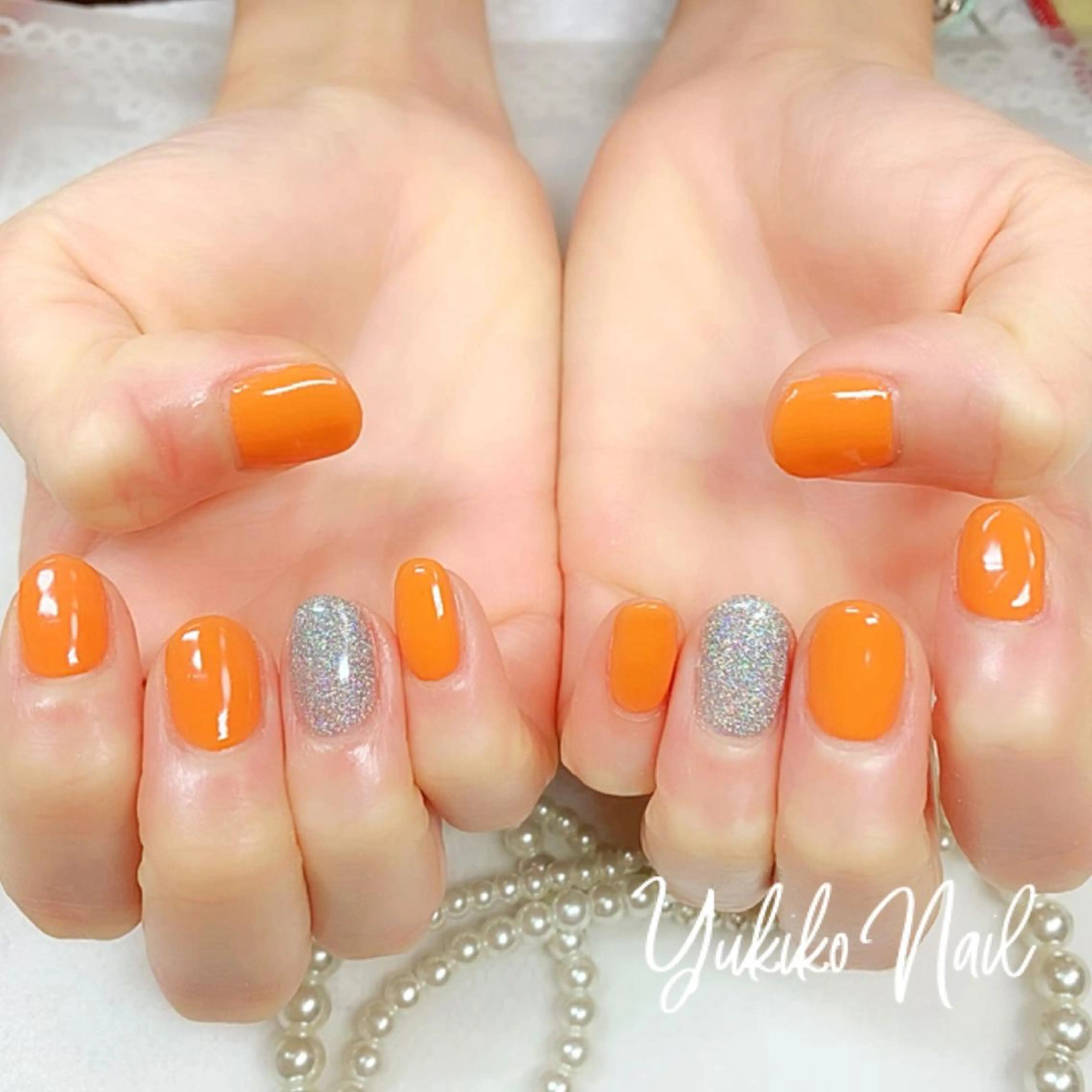ネイル ワンカラーネイル オレンジ シルバー ハンドネイル ユキコ ネイルのネイルデザイン