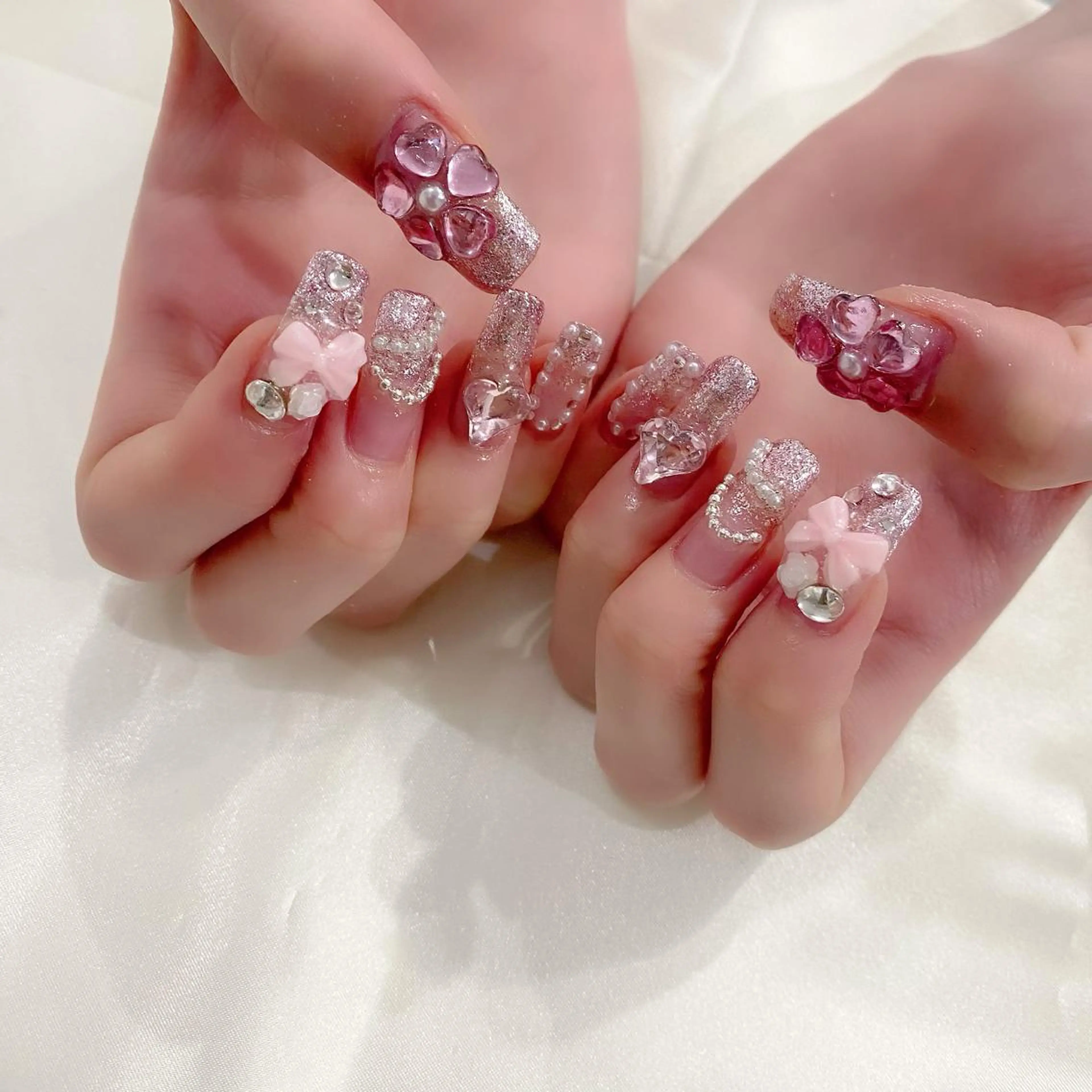 ネイル ハート ラメ(グリッター) ロングネイル ピンク リボン Salon Ｋのネイルデザイン