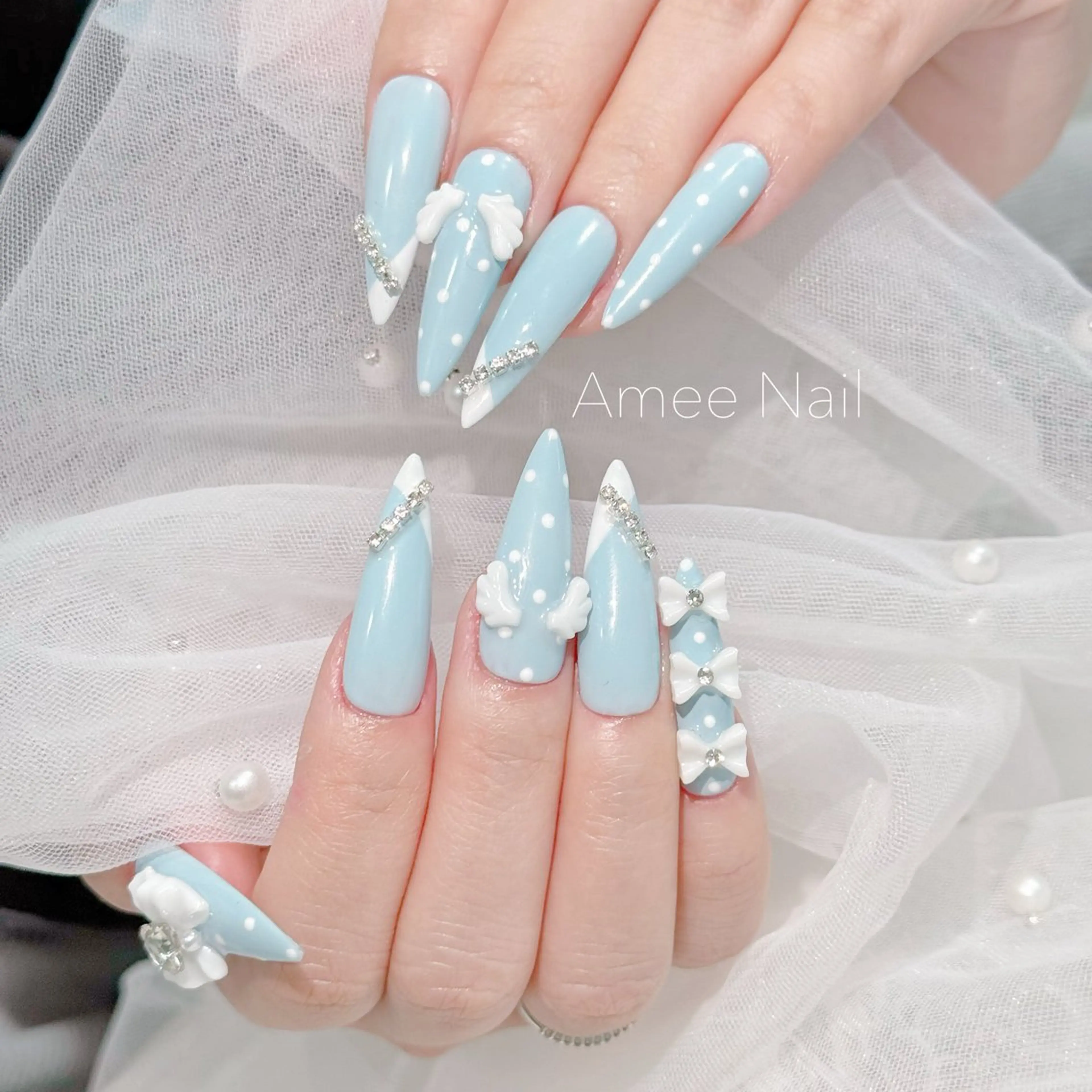 ネイル 成人式 ロングネイル マグネットネイル 大理石ネイル(マーブル) リボン ハンドネイル Amee Nail Salonのネイルデザイン