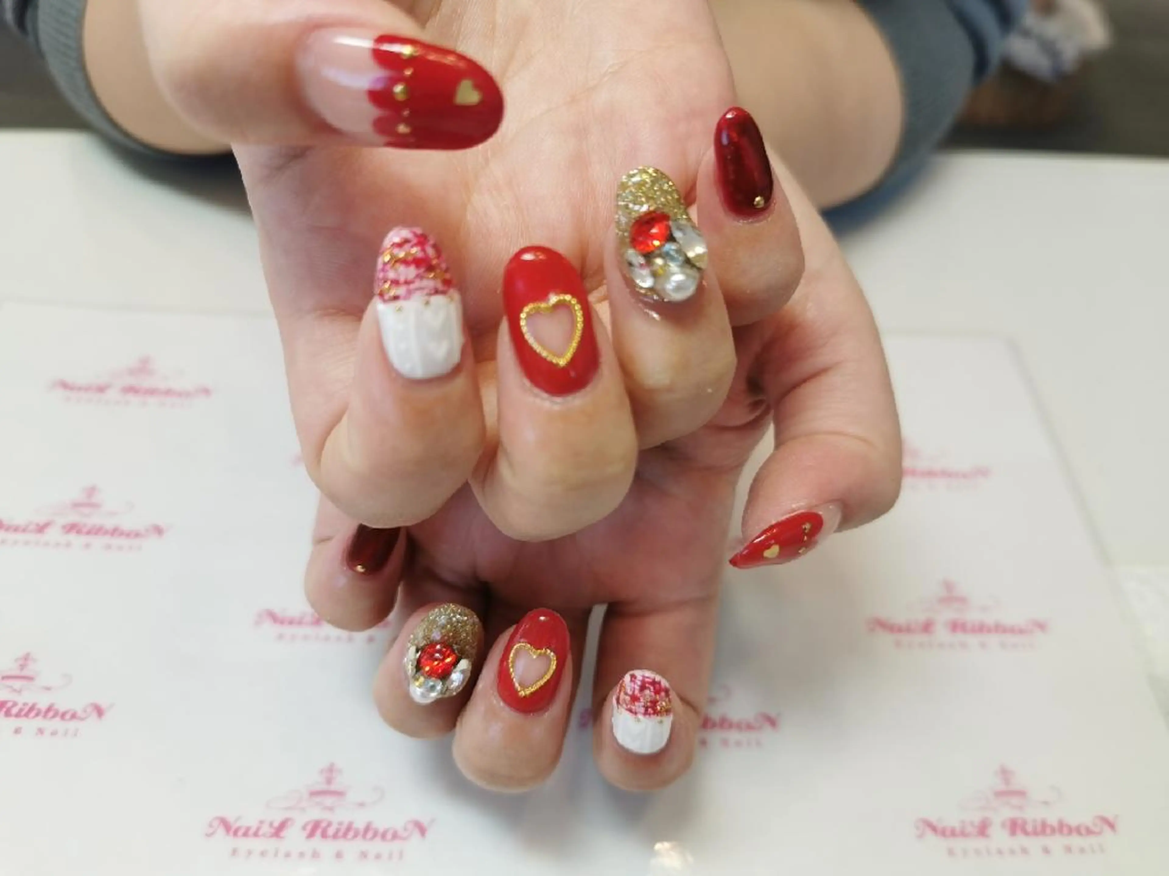 ネイル ネイルリボン 受付スタッフのネイルデザイン