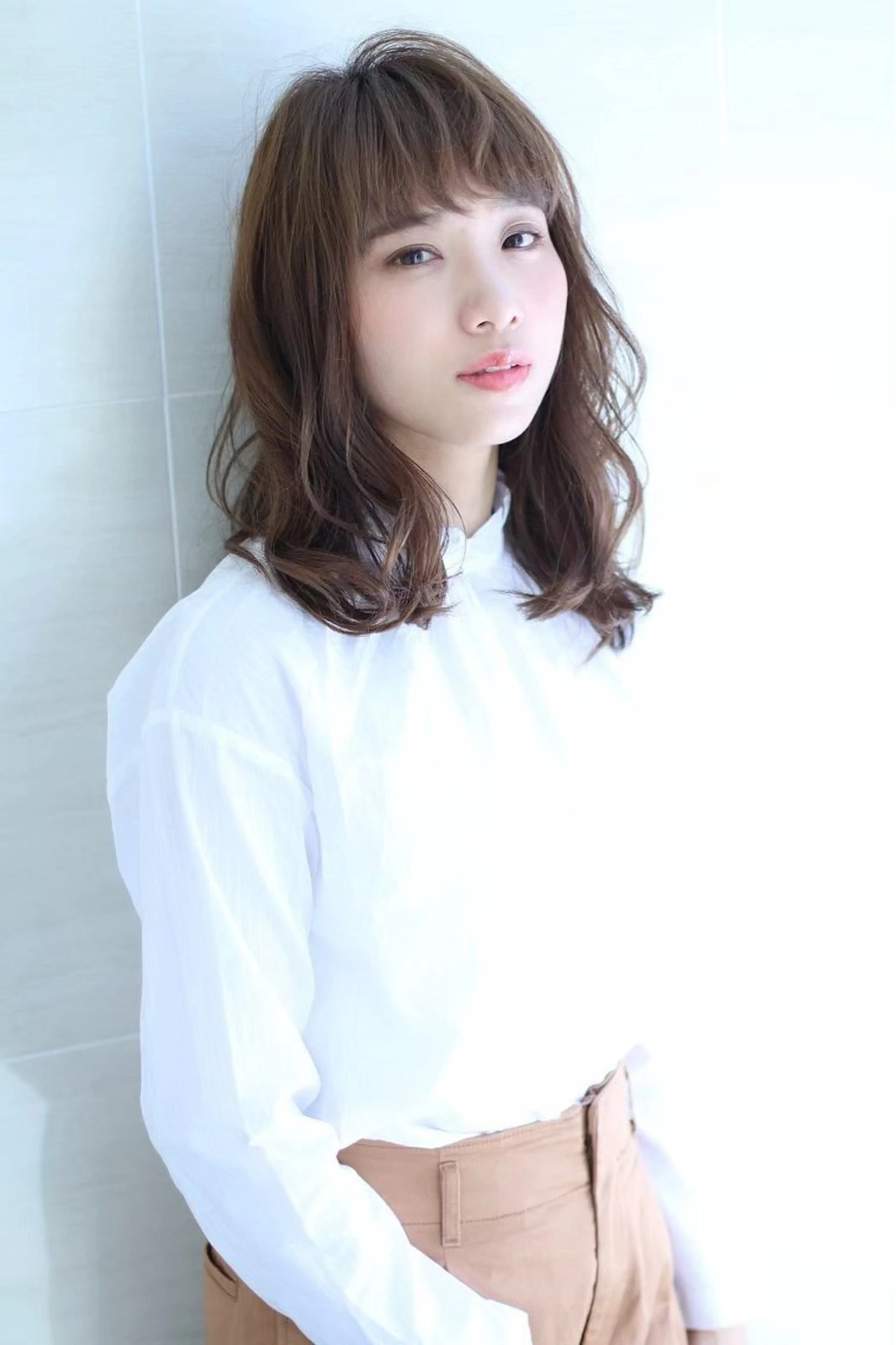 ミディアム パーマ 金 順惠のヘアスタイル