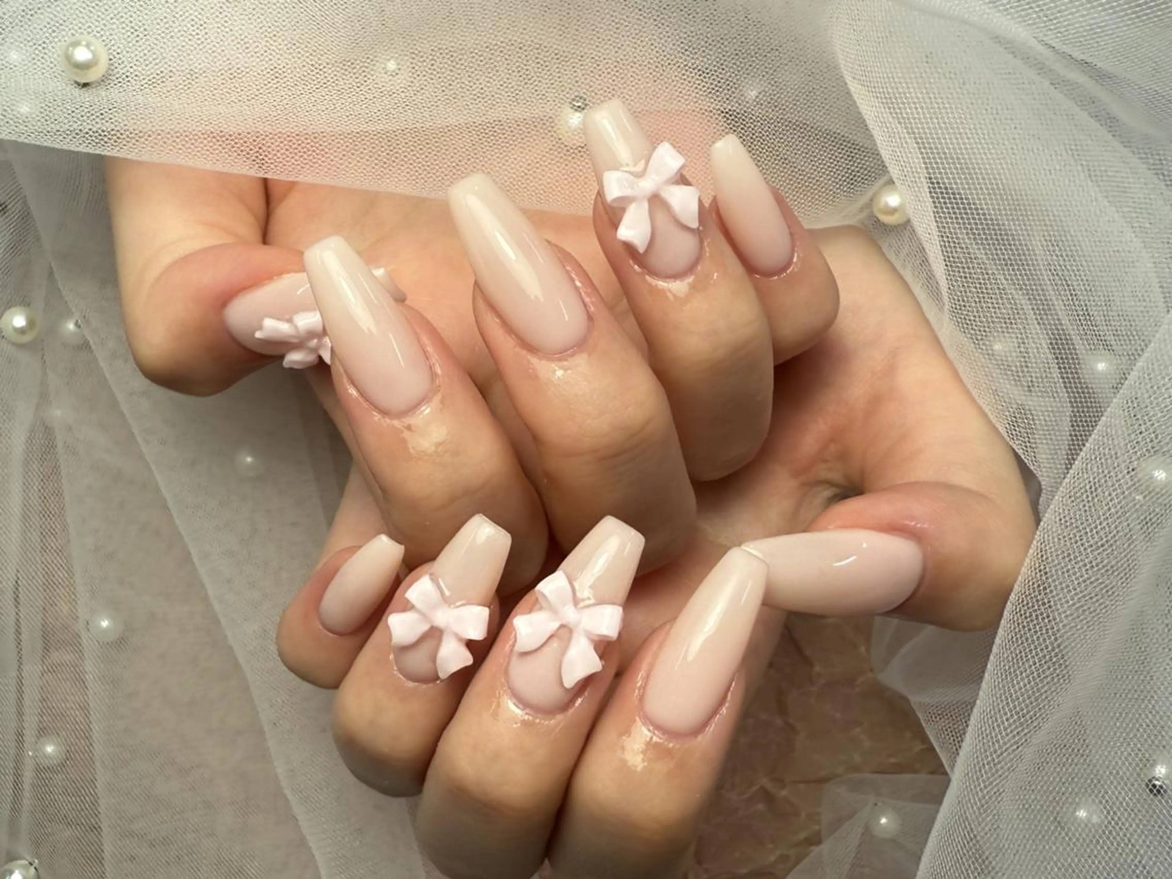 ネイル ピンク リボン ハンドネイル ToliyDeliy Nail Salonのネイルデザイン