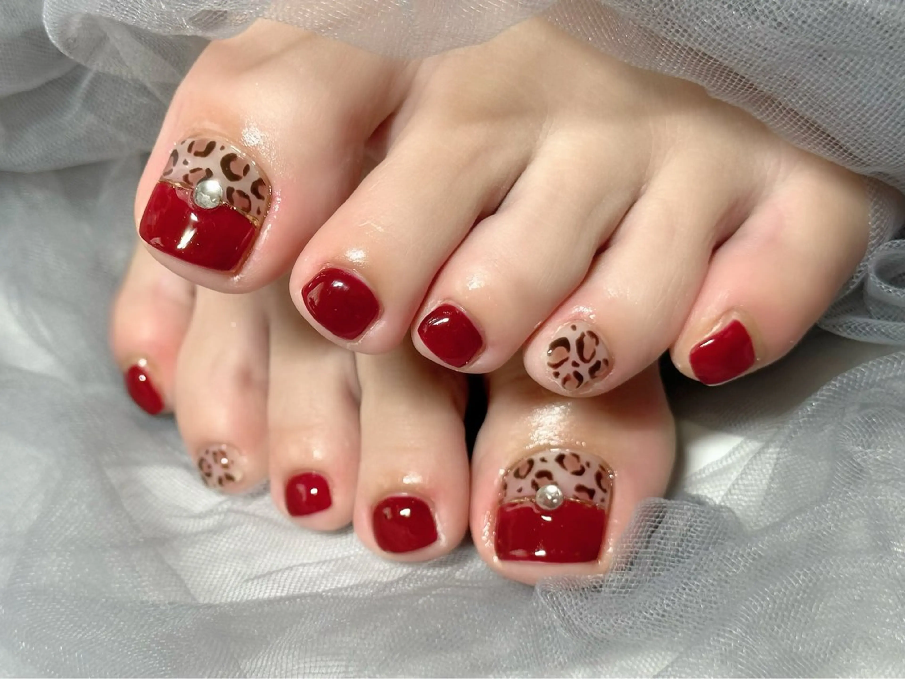 ネイル アニマル柄 ボルドー フットネイル Nail Salon KURELLYのネイルデザイン