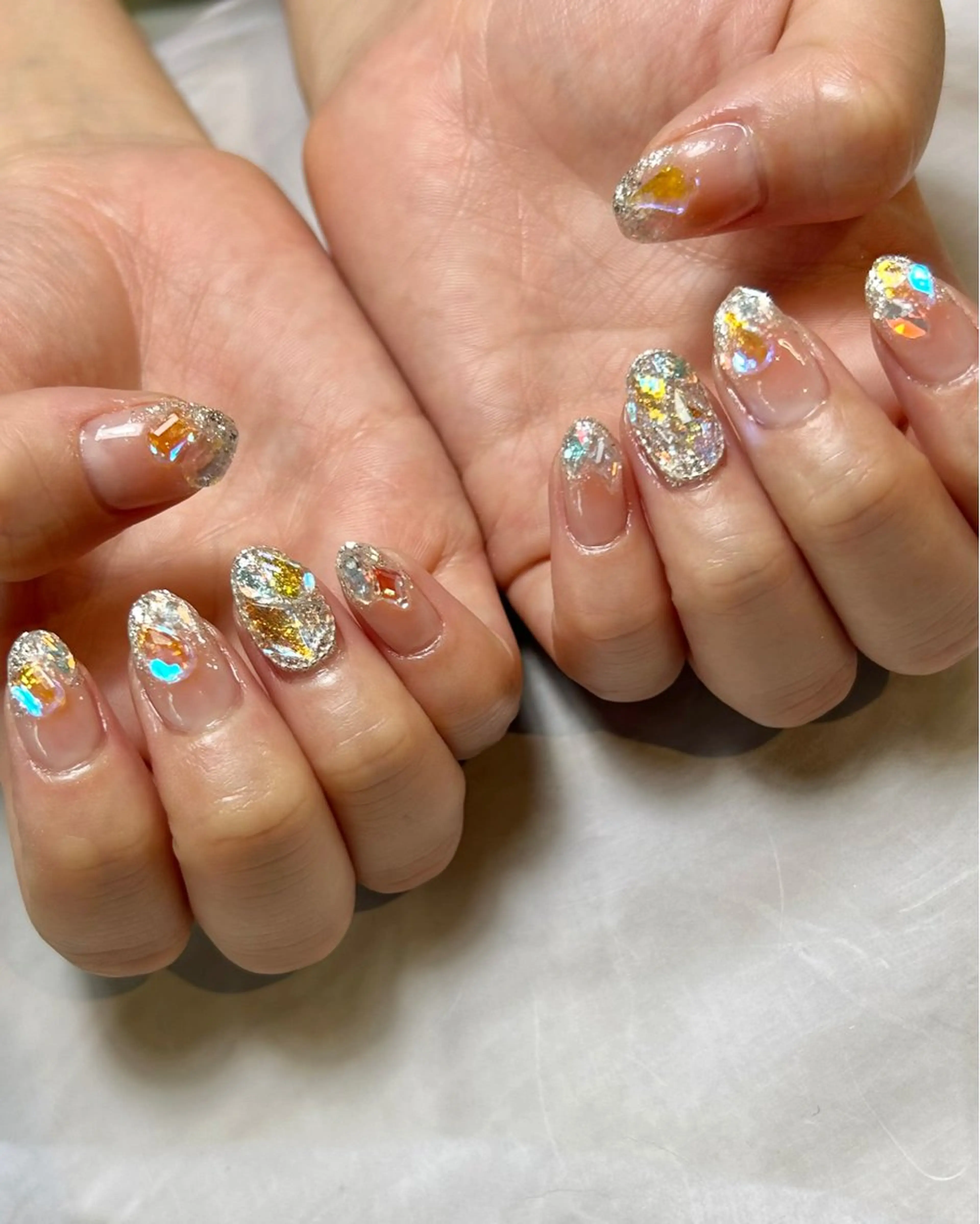 ネイル オーロラネイル 氷ネイル・うるうるネイル キラキラネイル 持ち込み ストーンネイル ハンドネイル Reflection marikoのネイルデザイン