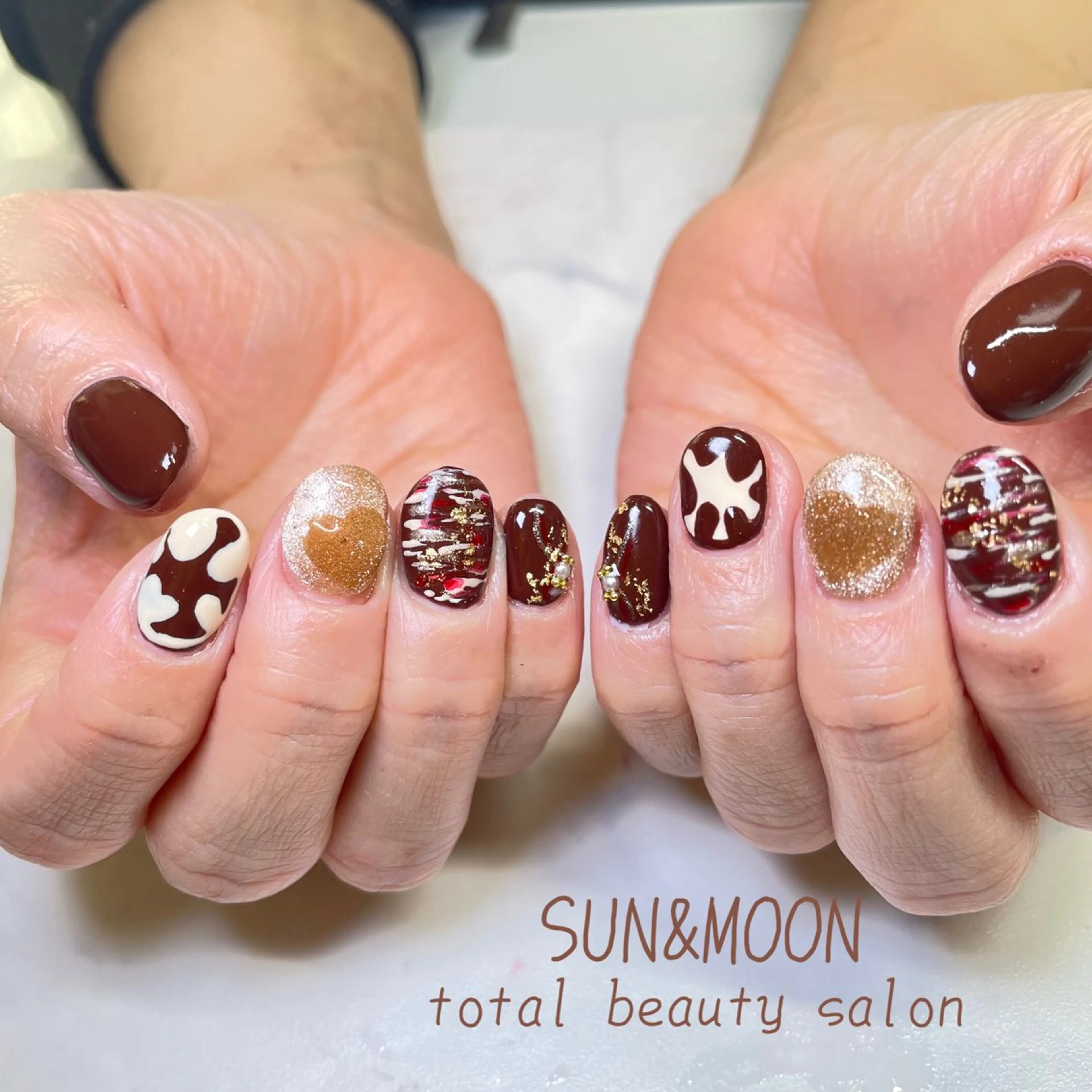 ネイル SUN&MOON REOのネイルデザイン