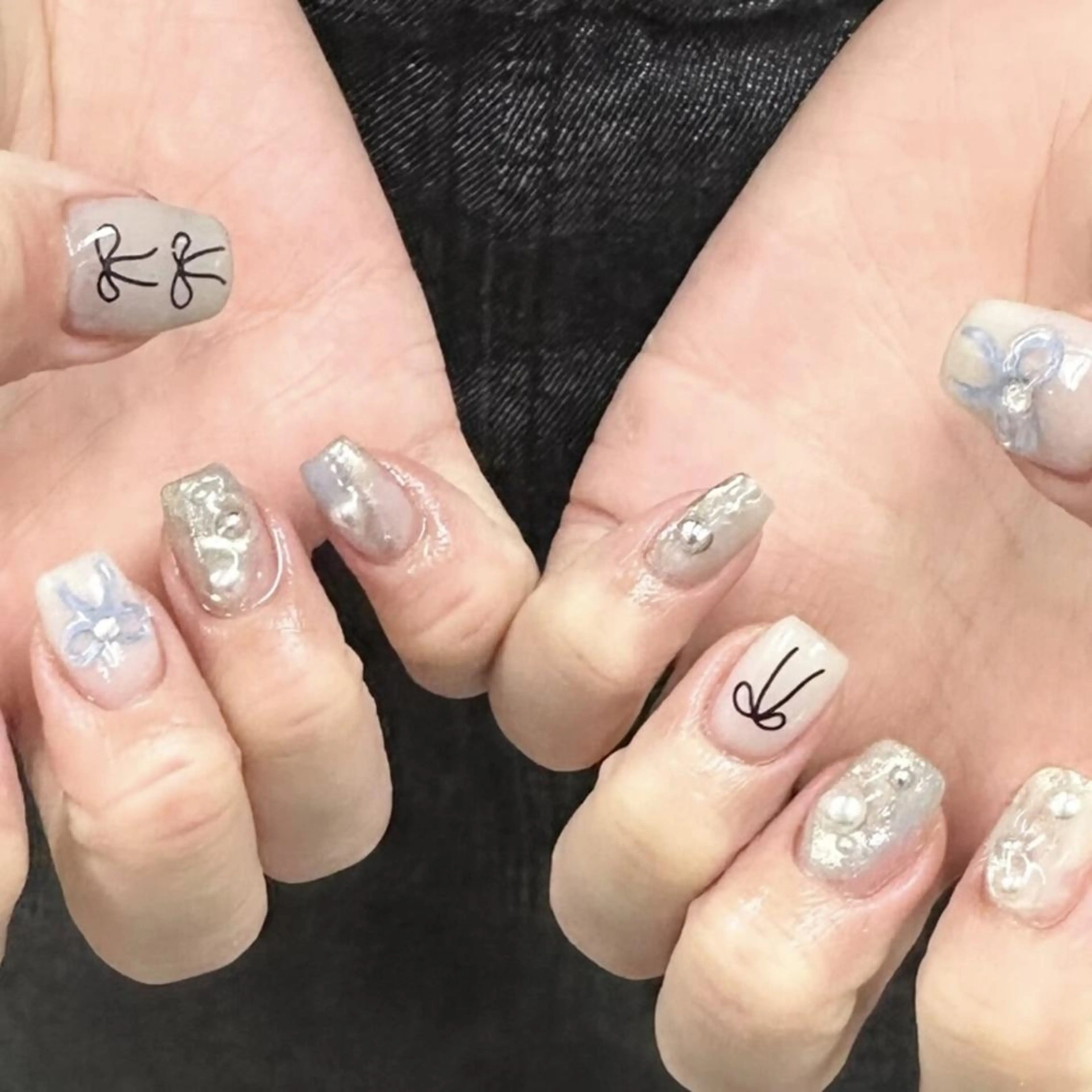 ネイル ジェルネイル 韓国ネイル ニュアンスネイル リボン ワンホンネイル nailstudio eviz新宿店のネイルデザイン