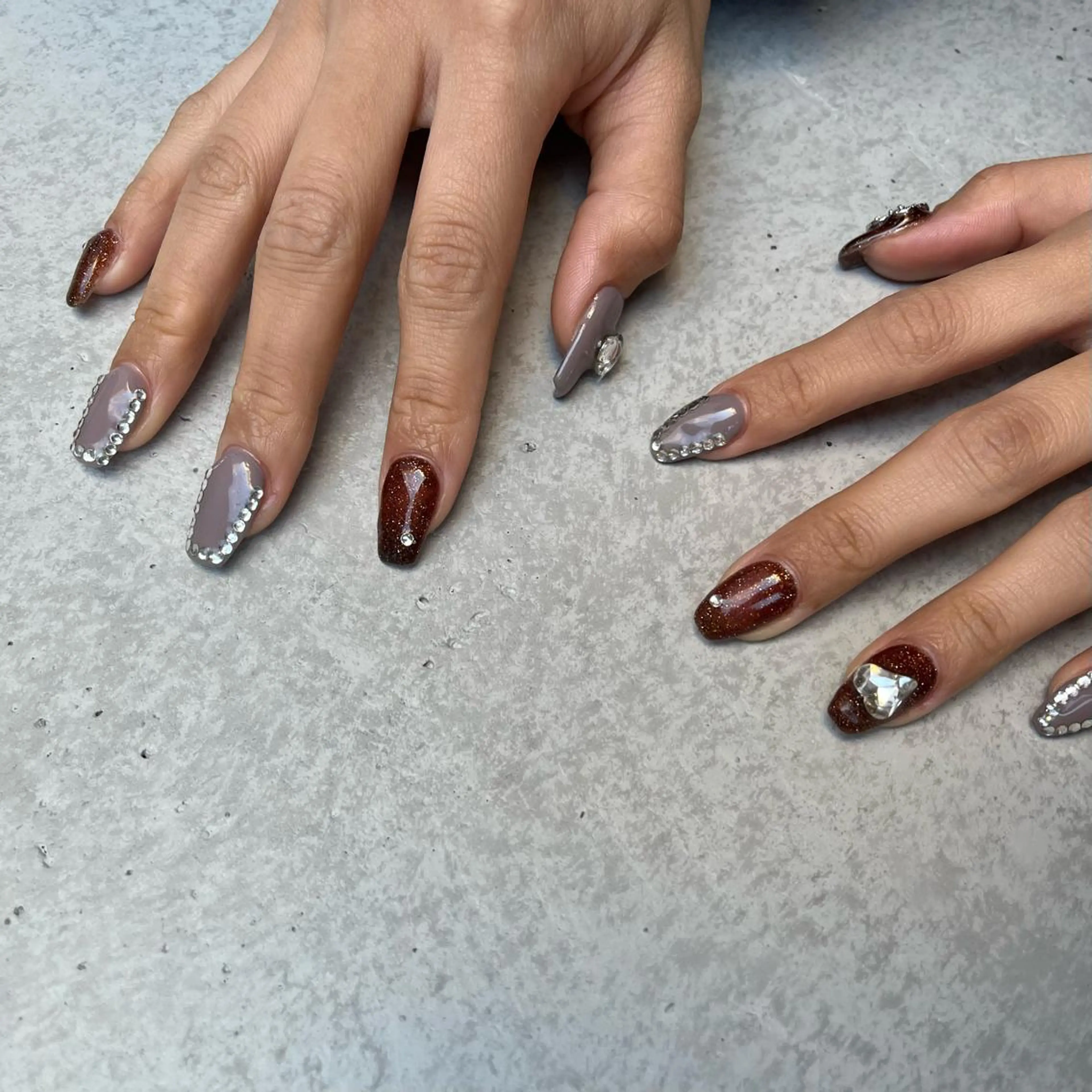 ネイル 🤎Two ERI🤎のネイルデザイン