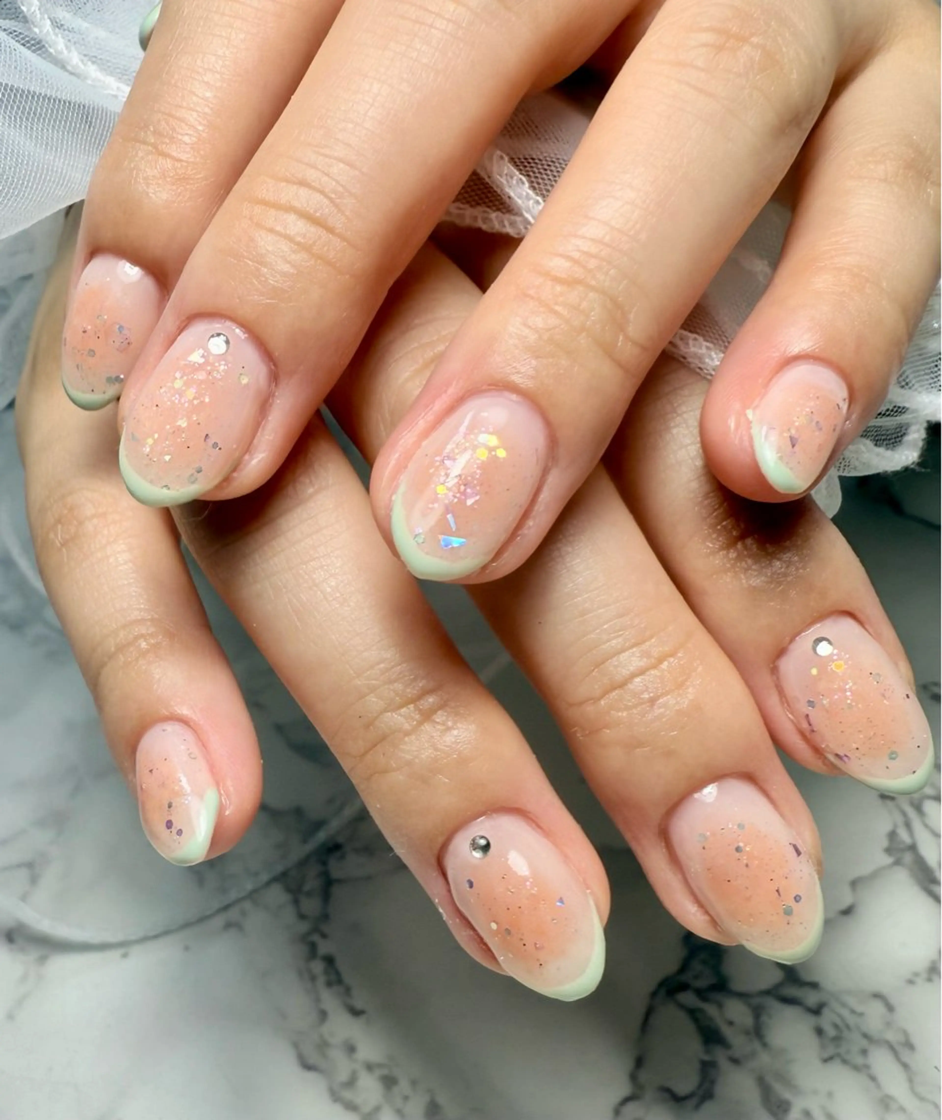 ネイル アートネイル フレンチネイル ガラスフレンチ 氷ネイル・うるうるネイル キラキラネイル M.N_ nailのネイルデザイン