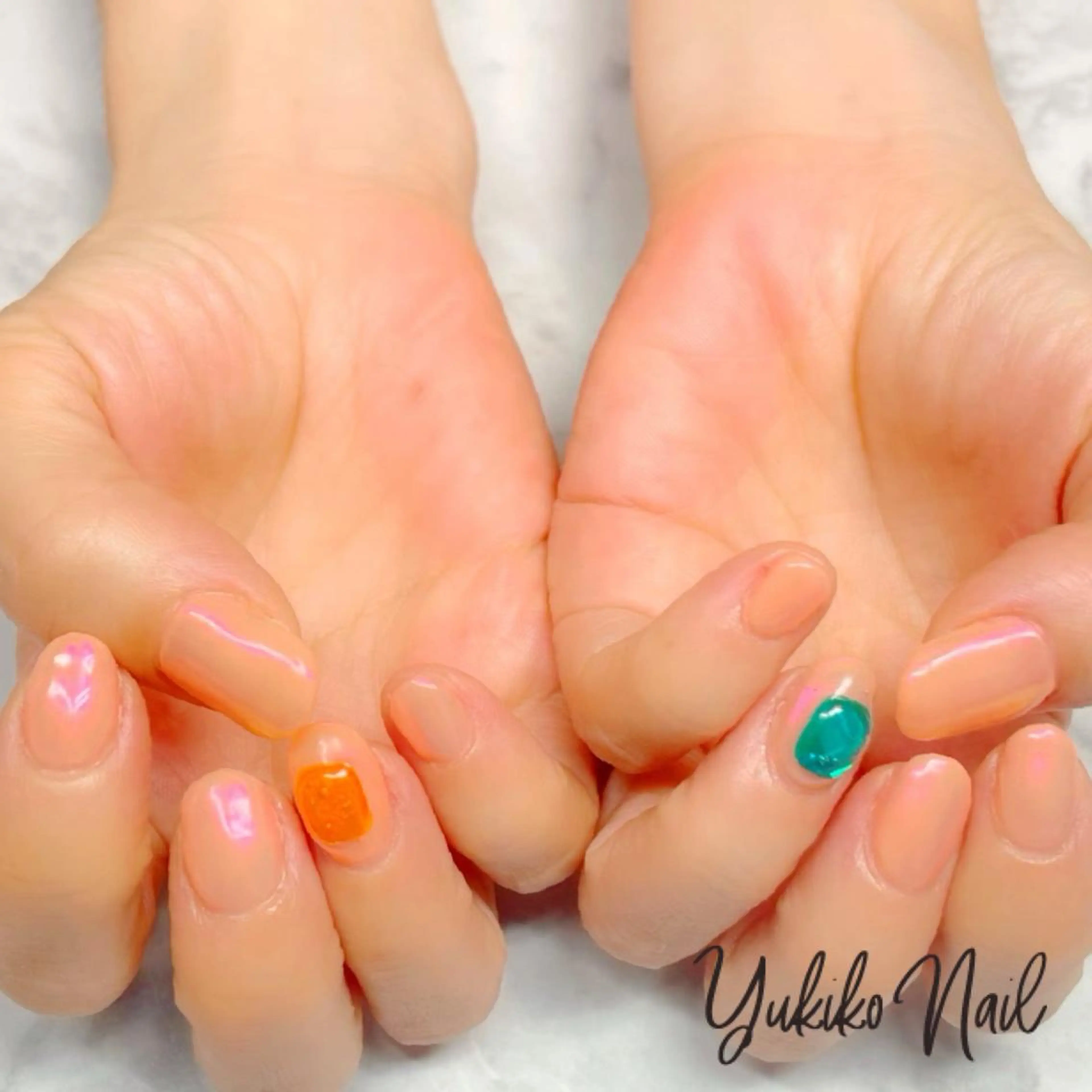 ネイル オーロラネイル 氷ネイル・うるうるネイル オレンジ ユキコ ネイルのネイルデザイン