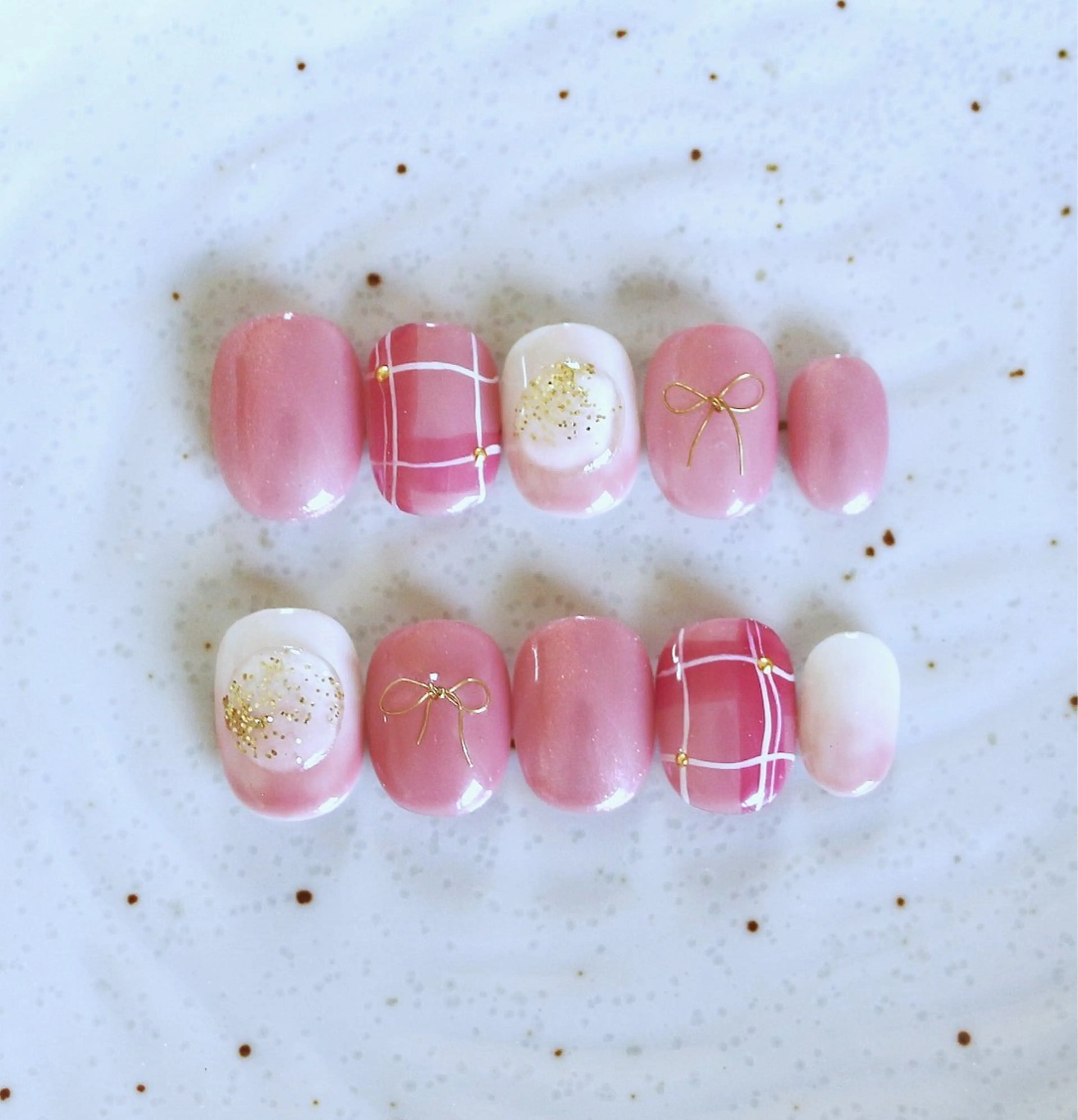 ネイル ガーリー ピンク リボン Baku Nailsのネイルデザイン