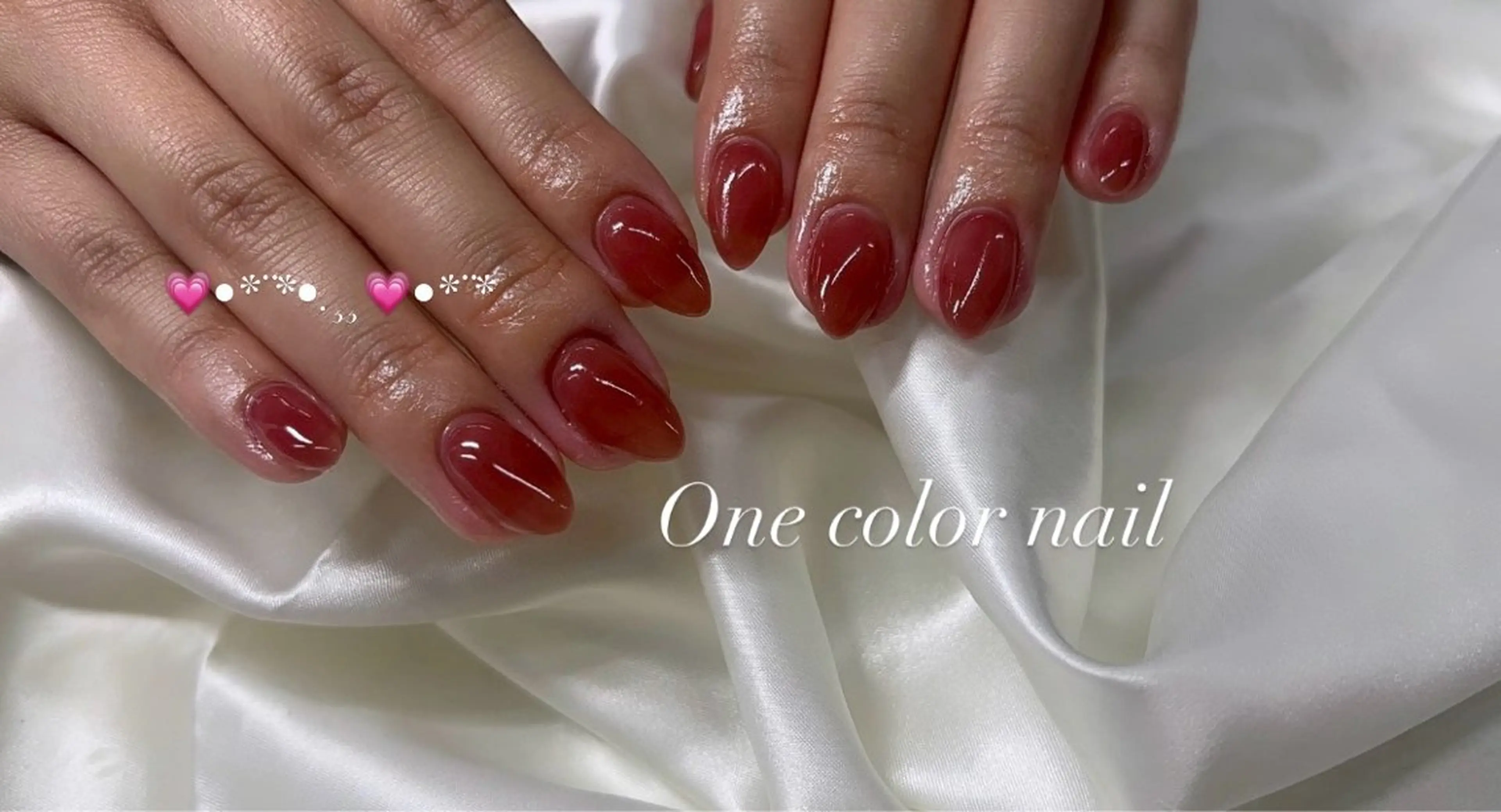 ネイル 韓国ネイル ワンカラーネイル 赤色 リボン 春ネイル Moana Oukaのネイルデザイン