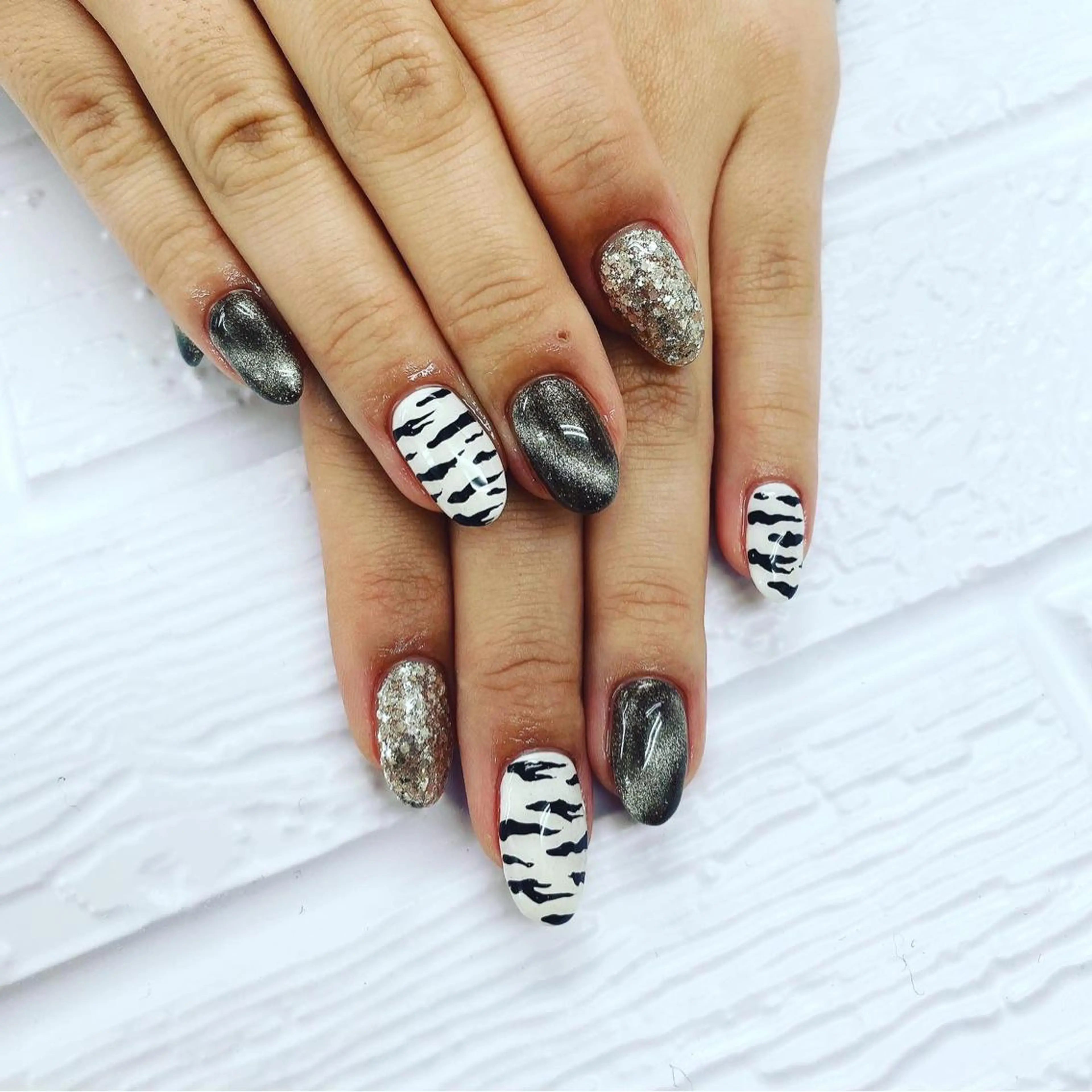 ネイル アニマル柄 N._._. clawのネイルデザイン