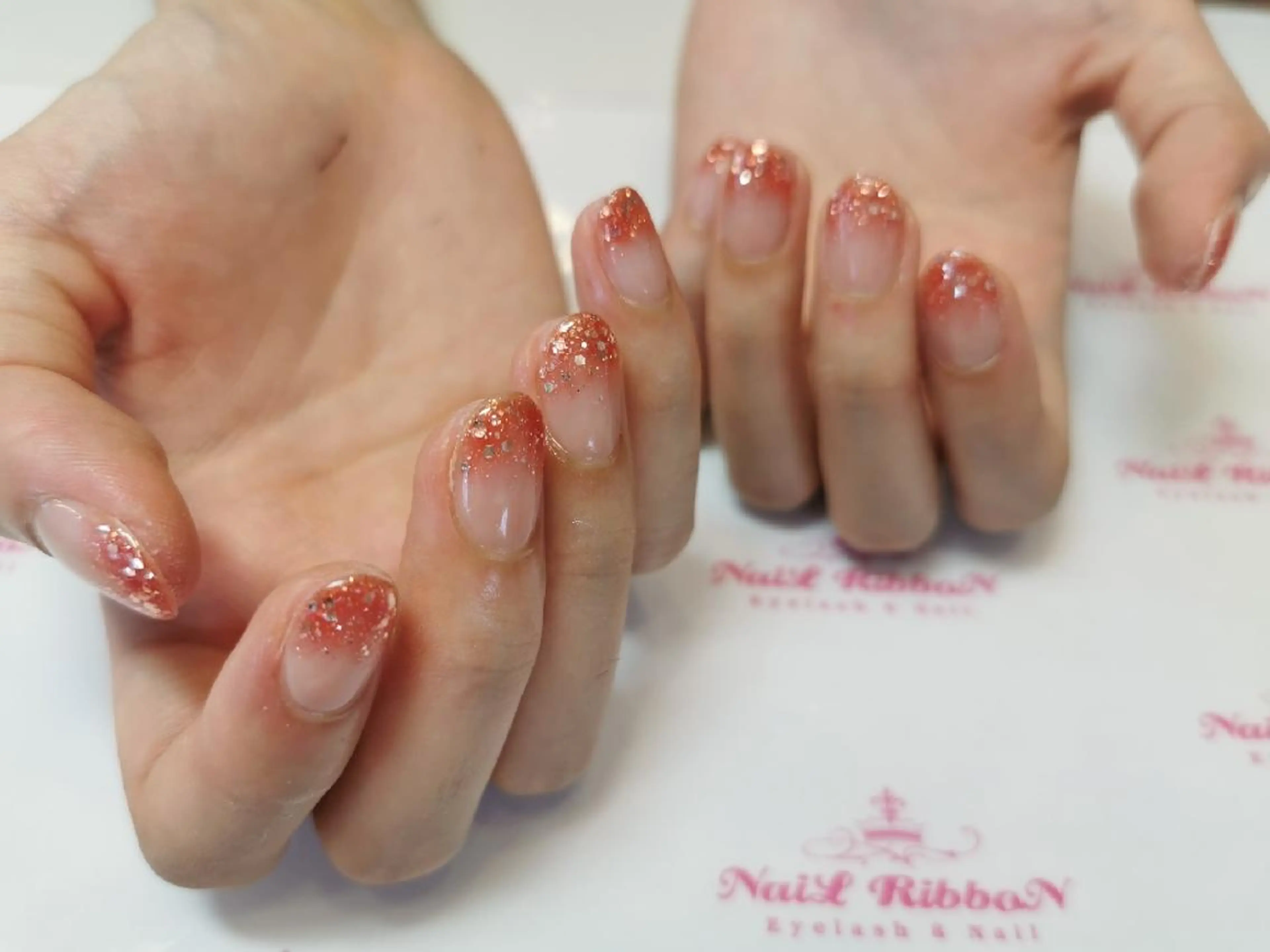 ネイル ネイルリボン 受付スタッフのネイルデザイン