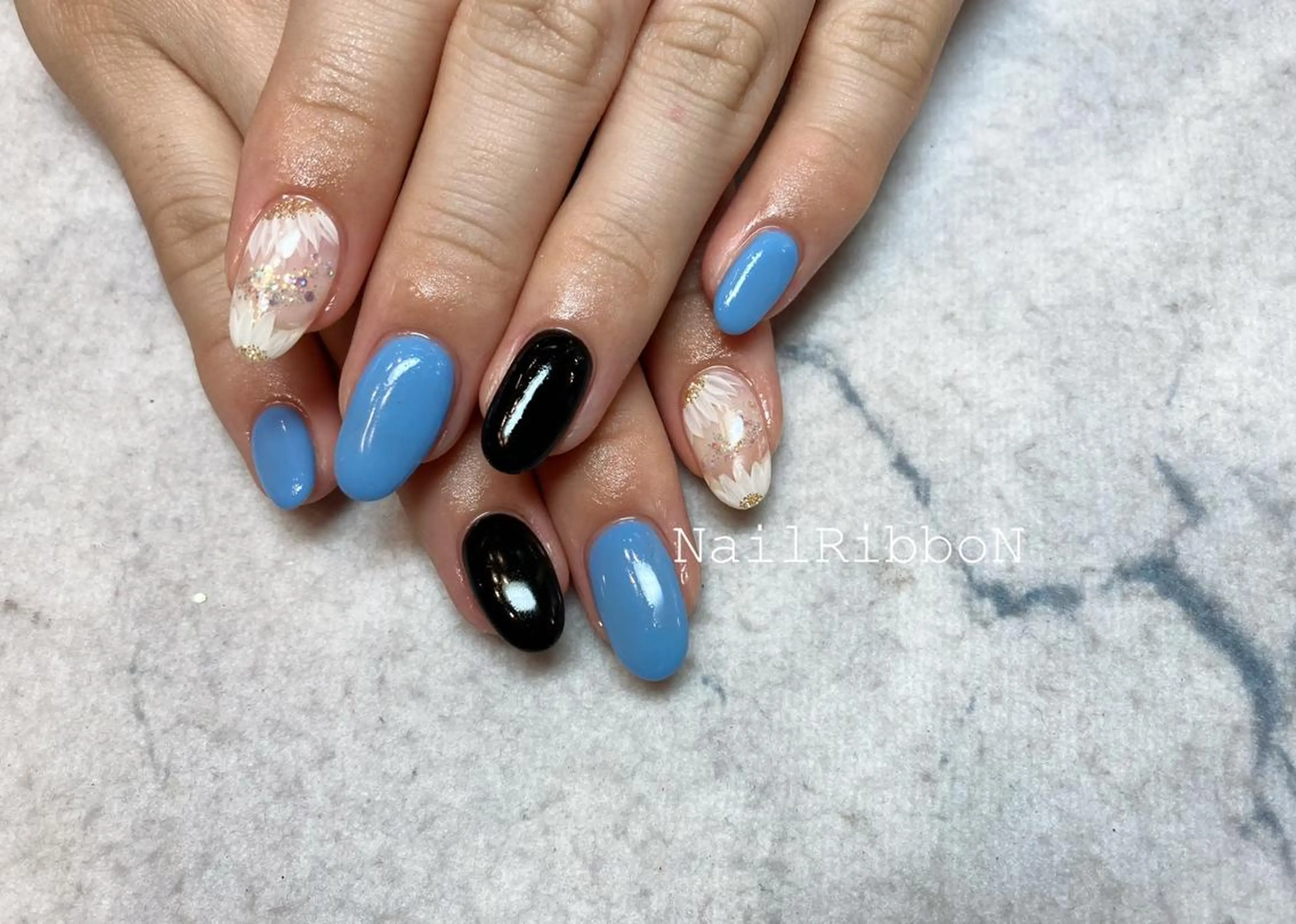 ネイル ネイルリボン 受付スタッフのネイルデザイン