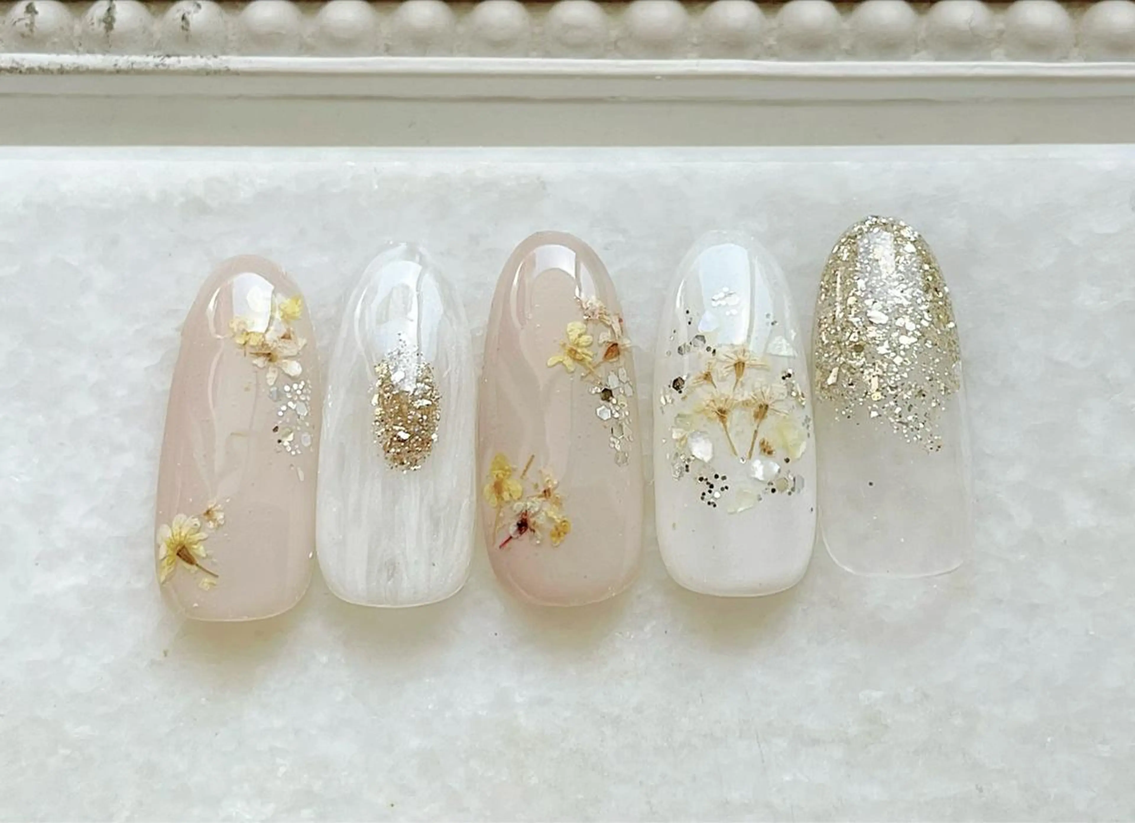 ネイル ジェルネイル キラキラネイル パラジェル 春ネイル ハンドネイル Satomi  のネイルデザイン
