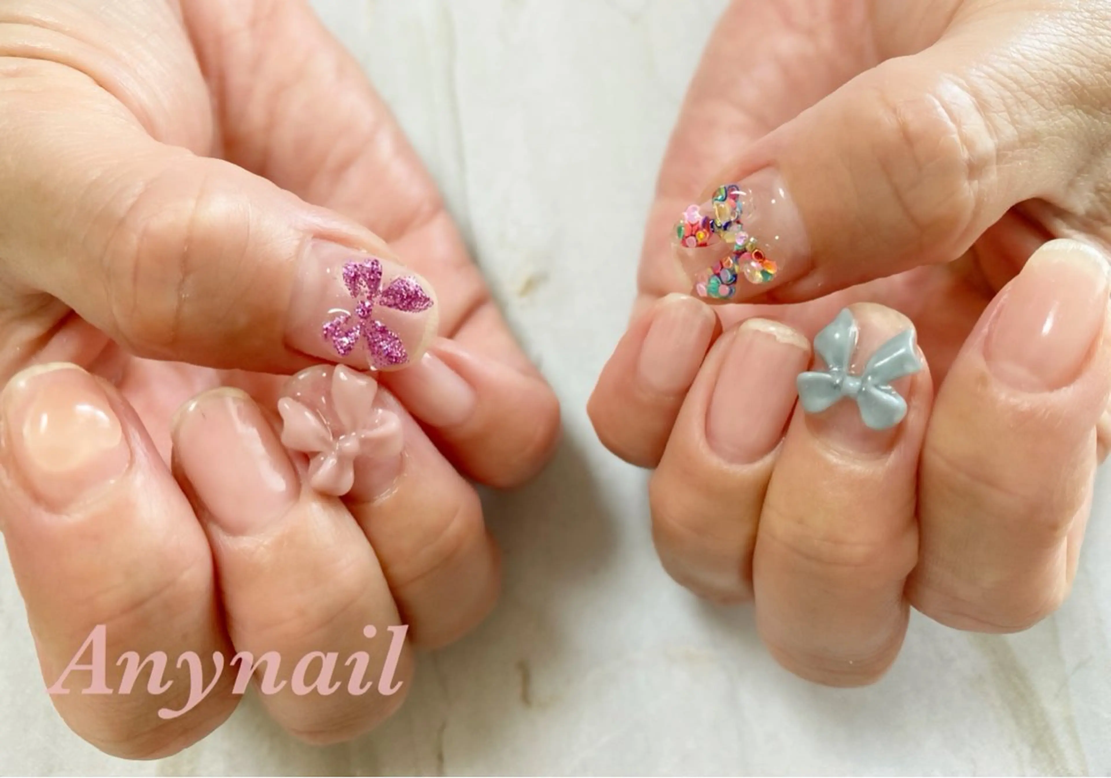 ネイル ブルー クリアネイル ジェルネイル ハート リボン 岩澤 恵子のネイルデザイン