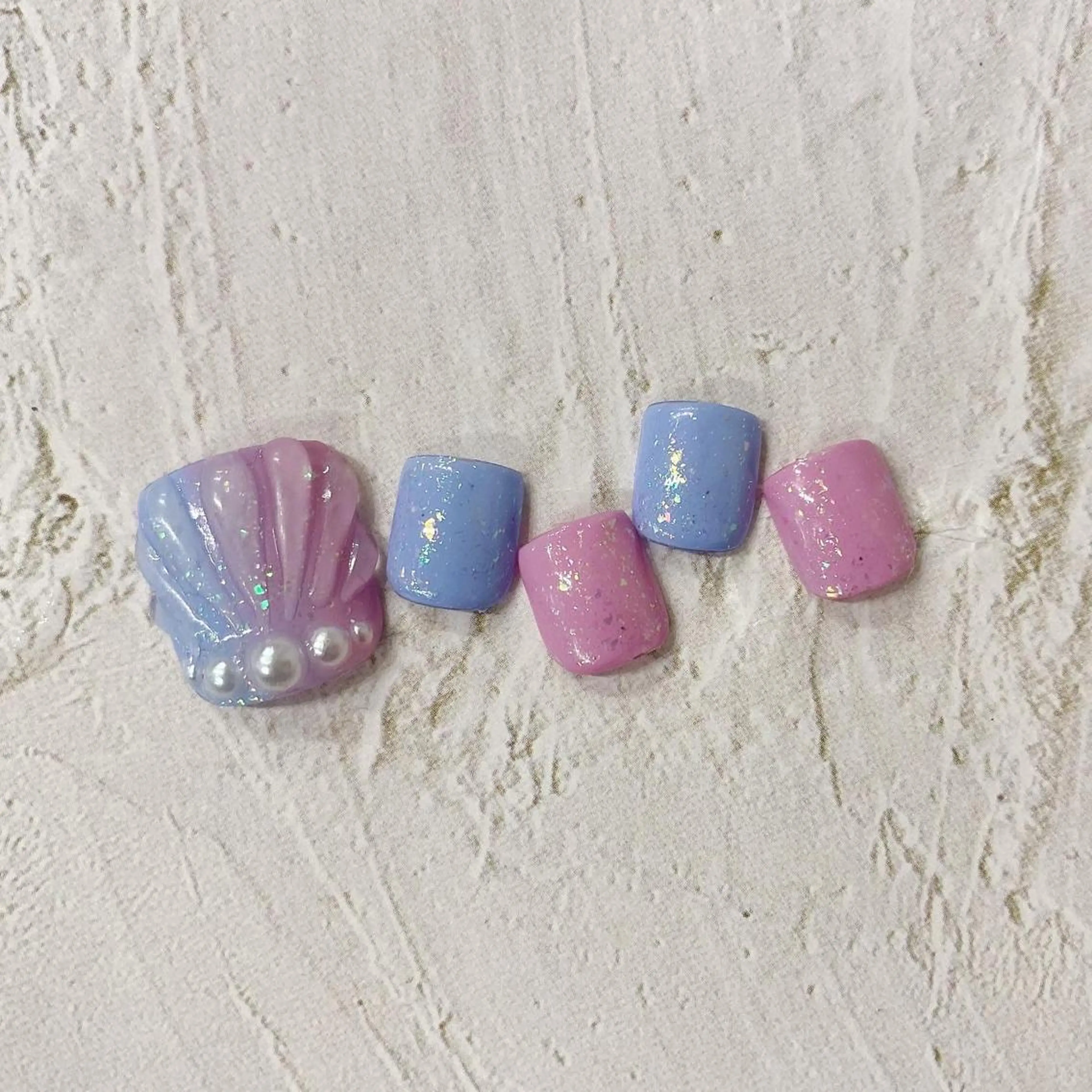 ネイル オーロラネイル フットネイル キラキラネイル 韓国ネイル 大理石ネイル(マーブル) melumooi nailのネイルデザイン