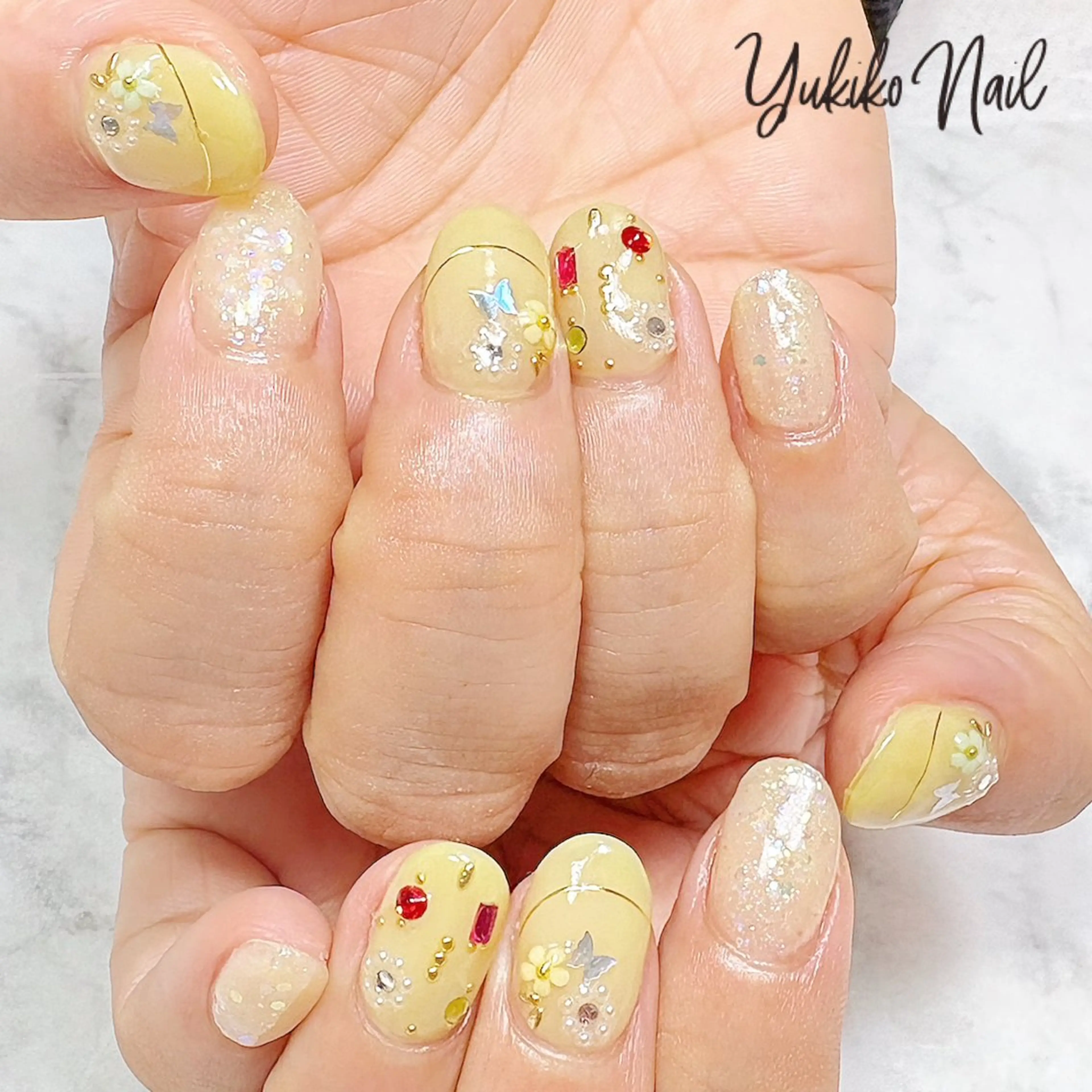 ネイル フラワーネイル パステルネイル 春ネイル 黄色 ハンドネイル ユキコ ネイルのネイルデザイン
