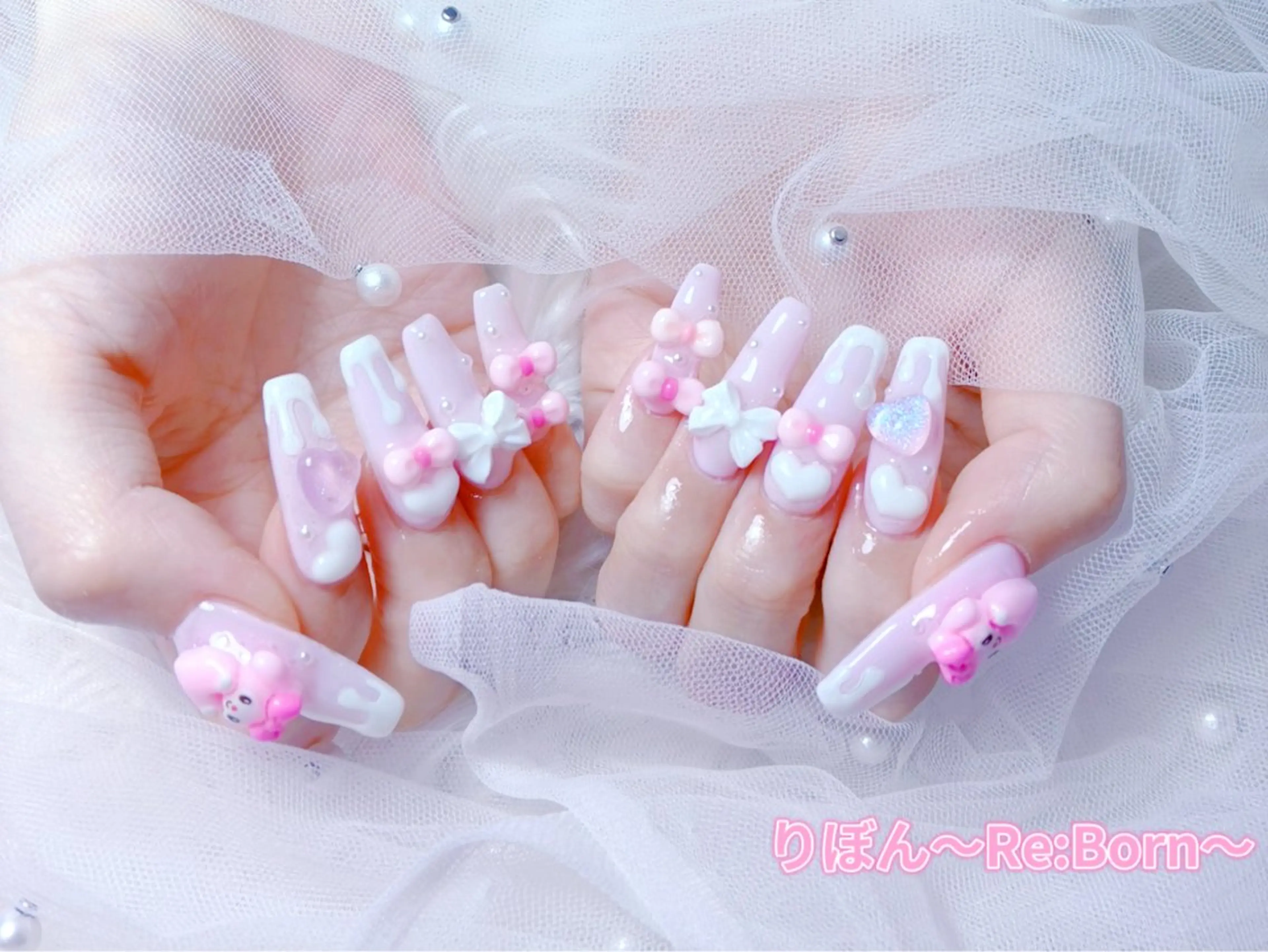 セミロング 韓国風ヘア りぼん Re:Bonrのネイルデザイン