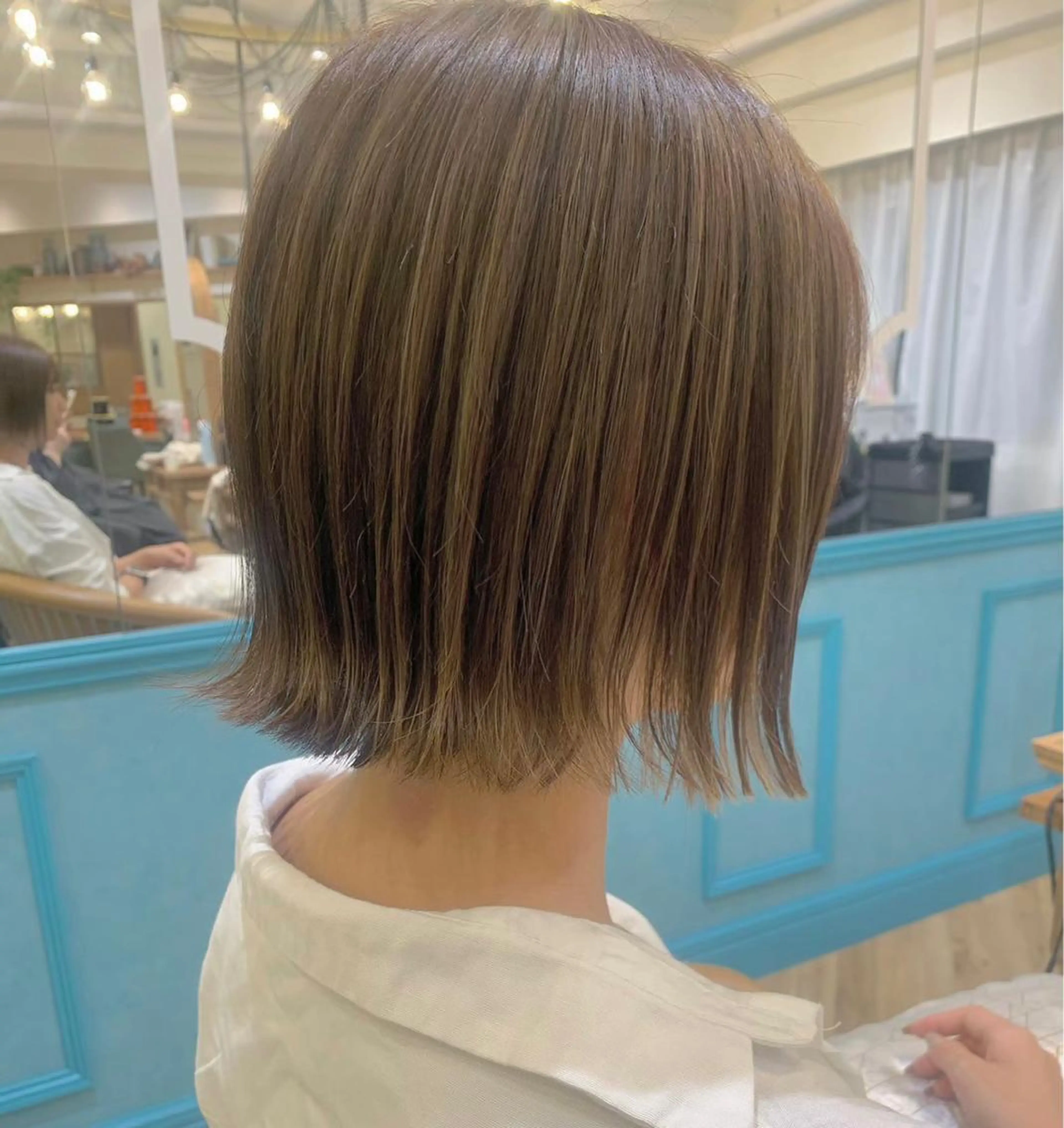 ミディアム ボブ 小顔カット 外ハネヘア 【池袋店 店長】伊藤 昂樹/曲がる縮毛矯正のヘアスタイル