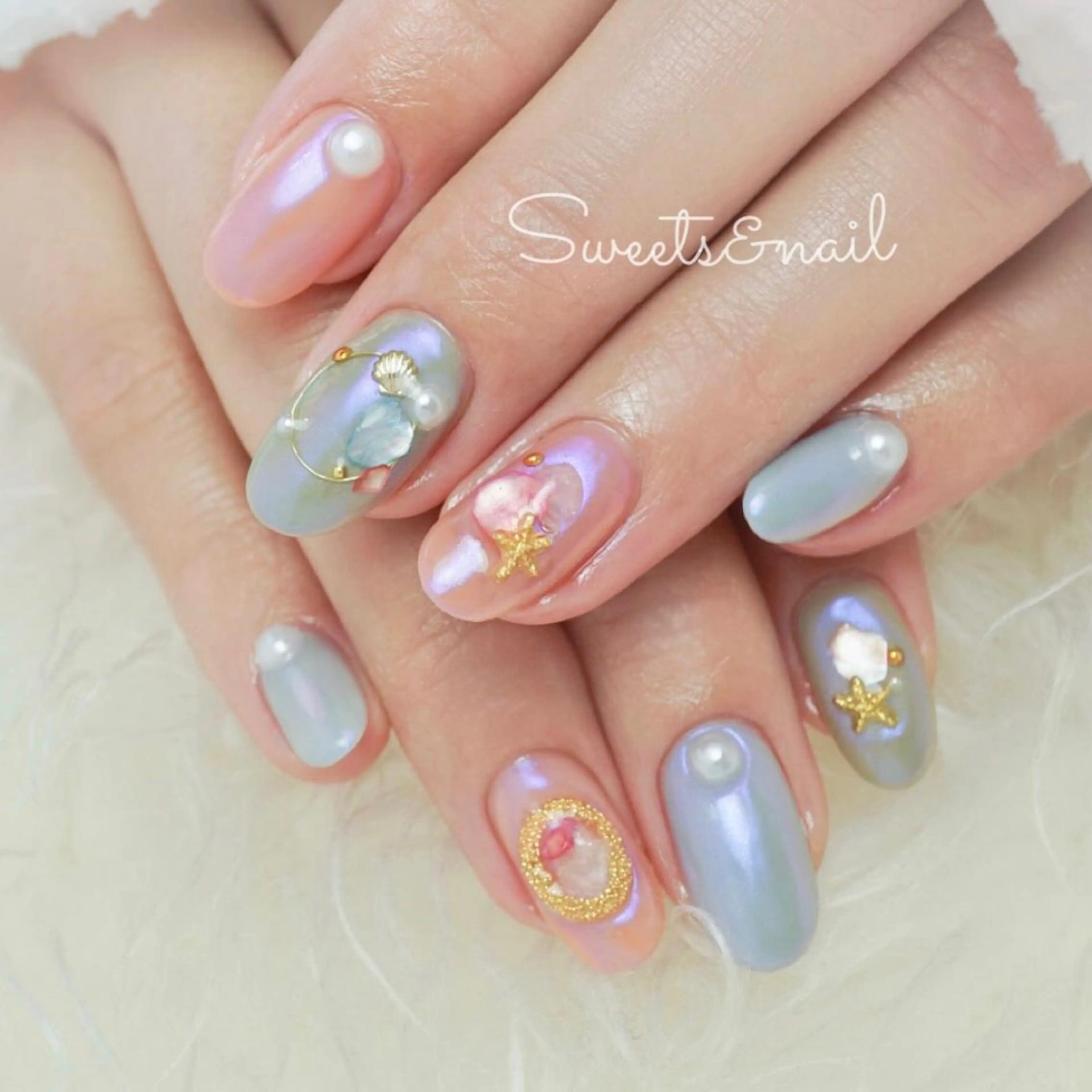 ネイル アートネイル キラキラネイル 水色 ミラーネイル 持ち込み Sweets＆ nail みなこのネイルデザイン