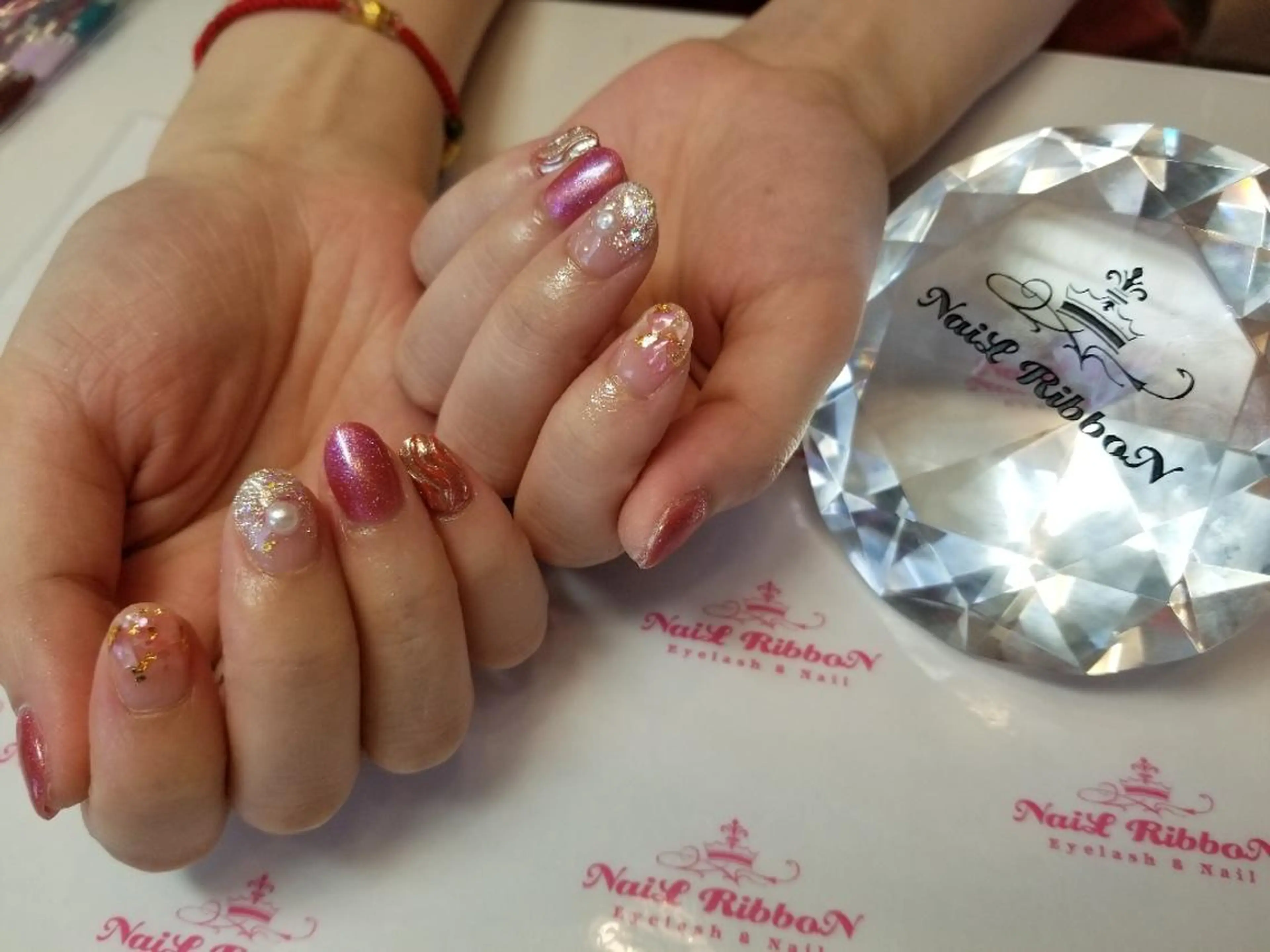 ネイル ネイルリボン 受付スタッフのネイルデザイン