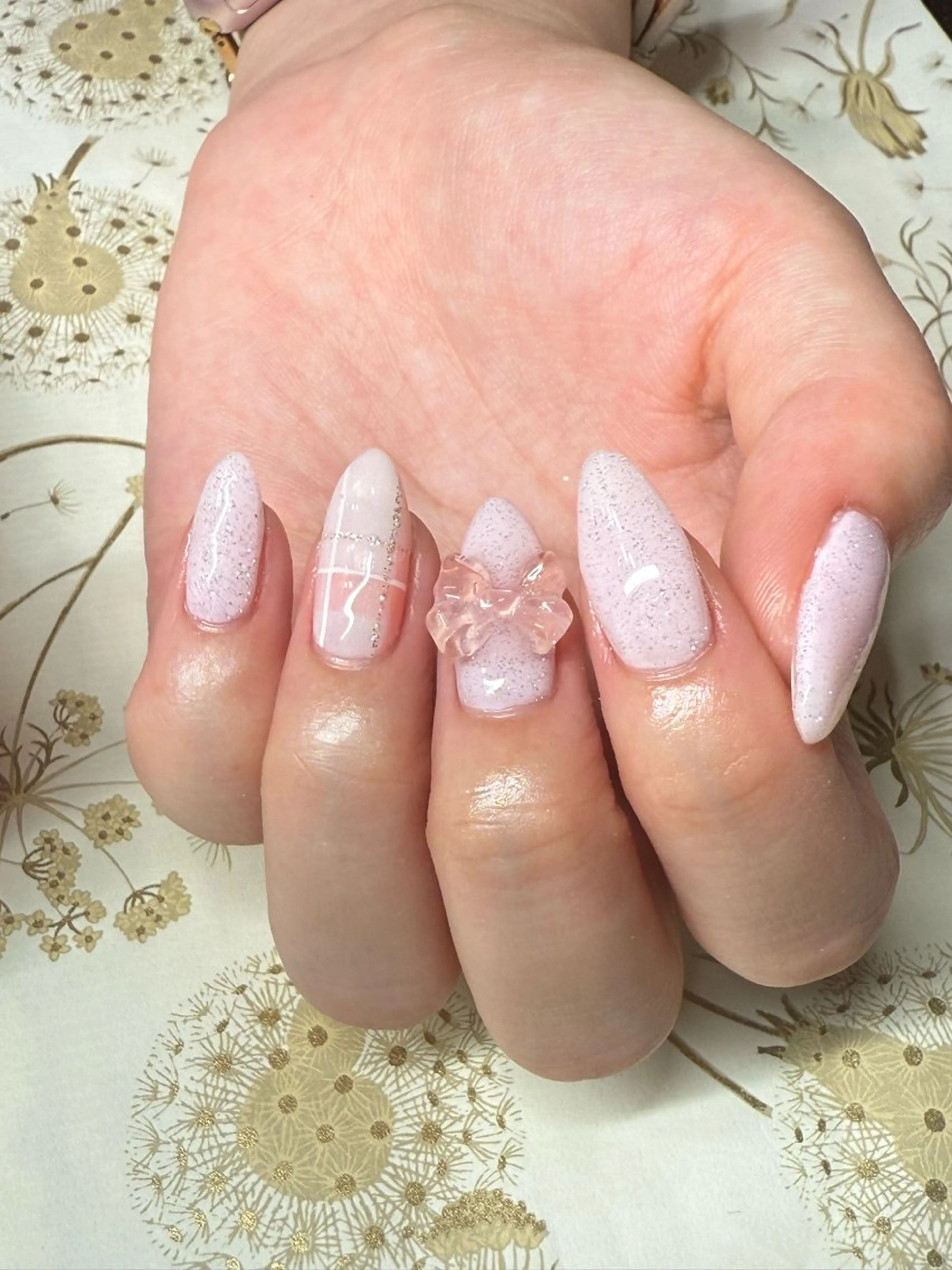 ネイル キラキラネイル ロングネイル ピンク リボン ハンドネイル miel nailのネイルデザイン