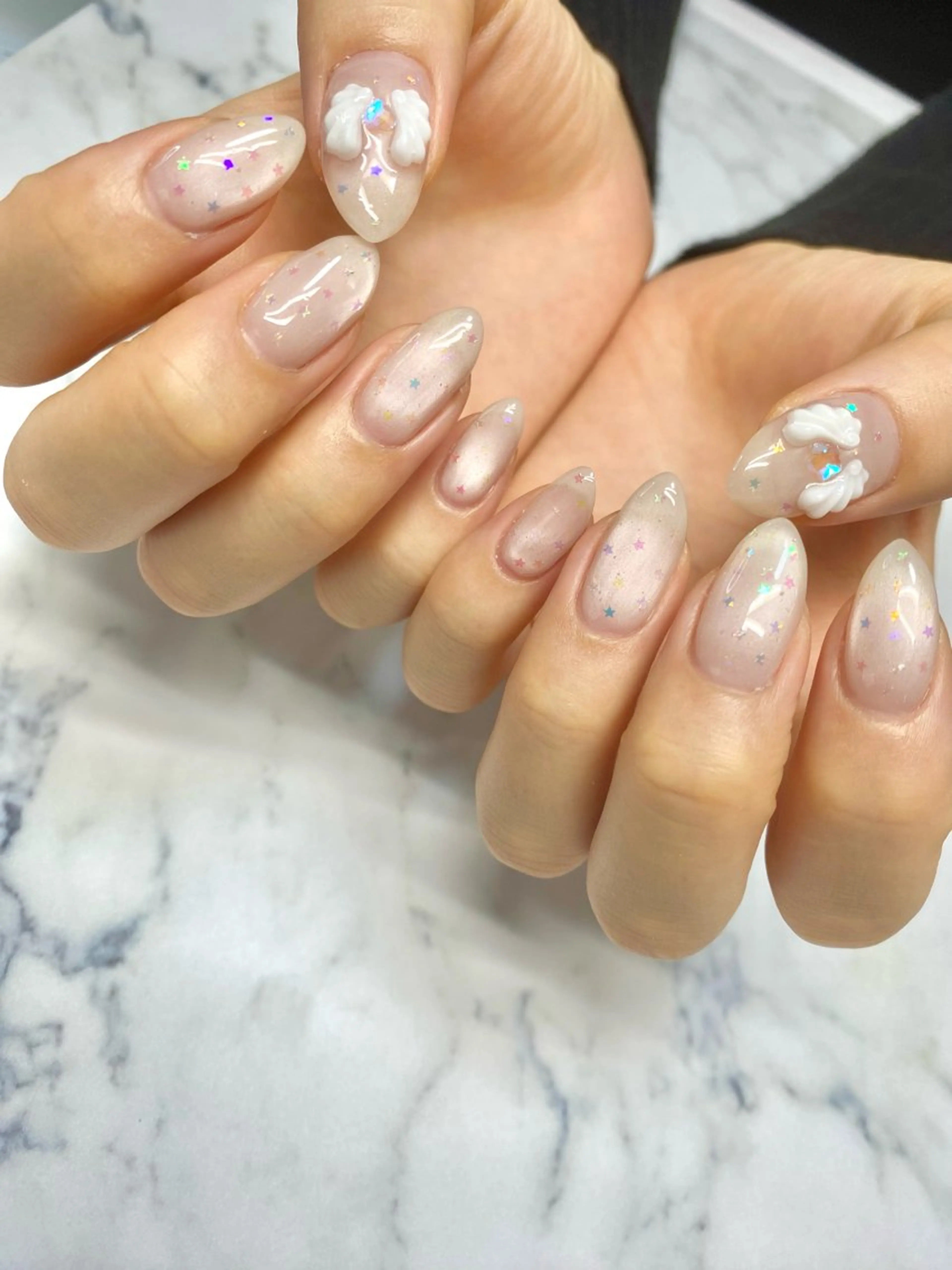 ネイル ジェルネイル キラキラネイル マグネットネイル ホワイト ハンドネイル Nail Salon BeBe所属・Nail salon BeBeのネイルデザイン