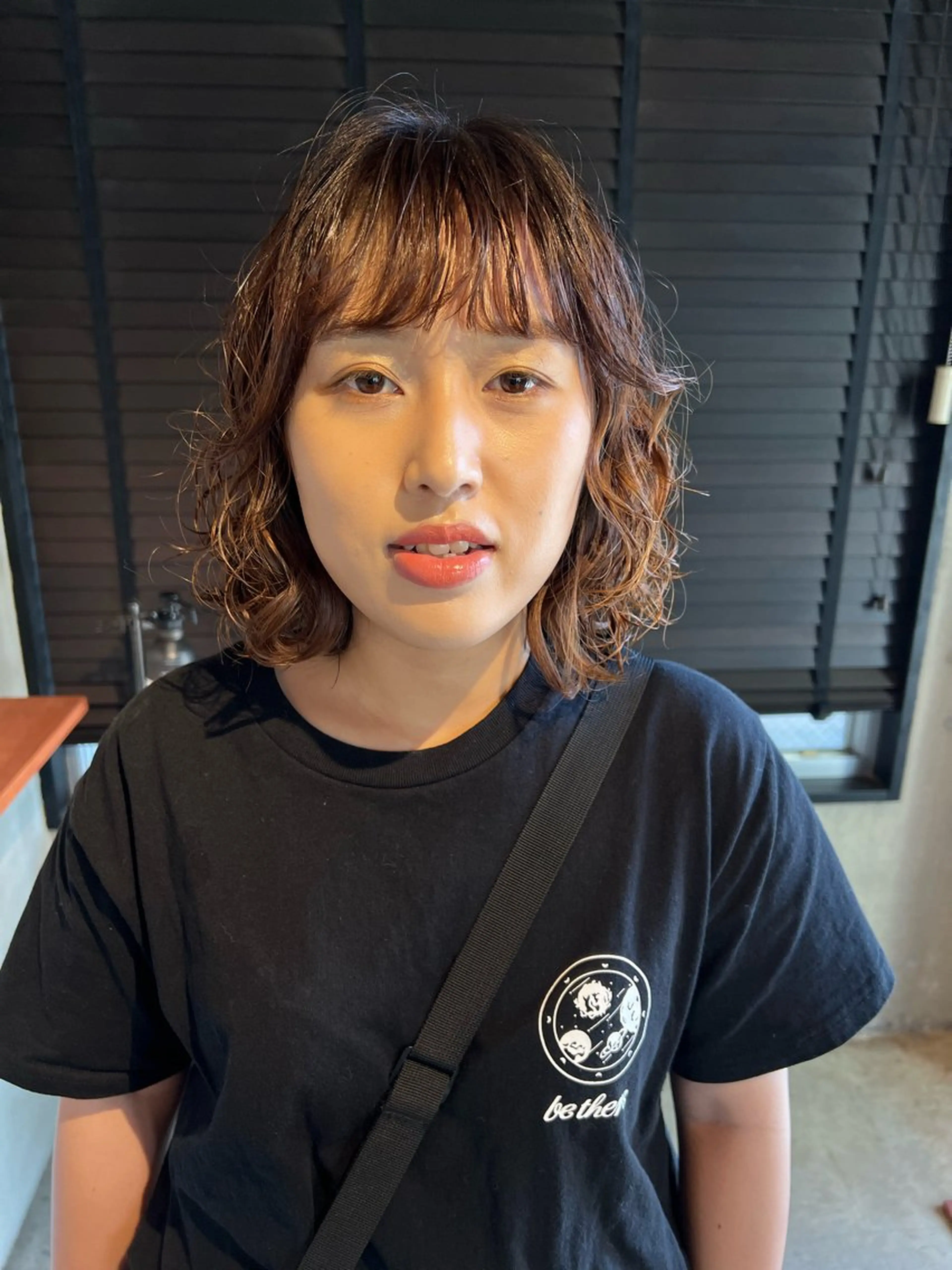 パーマ 乕谷 美潮のヘアスタイル