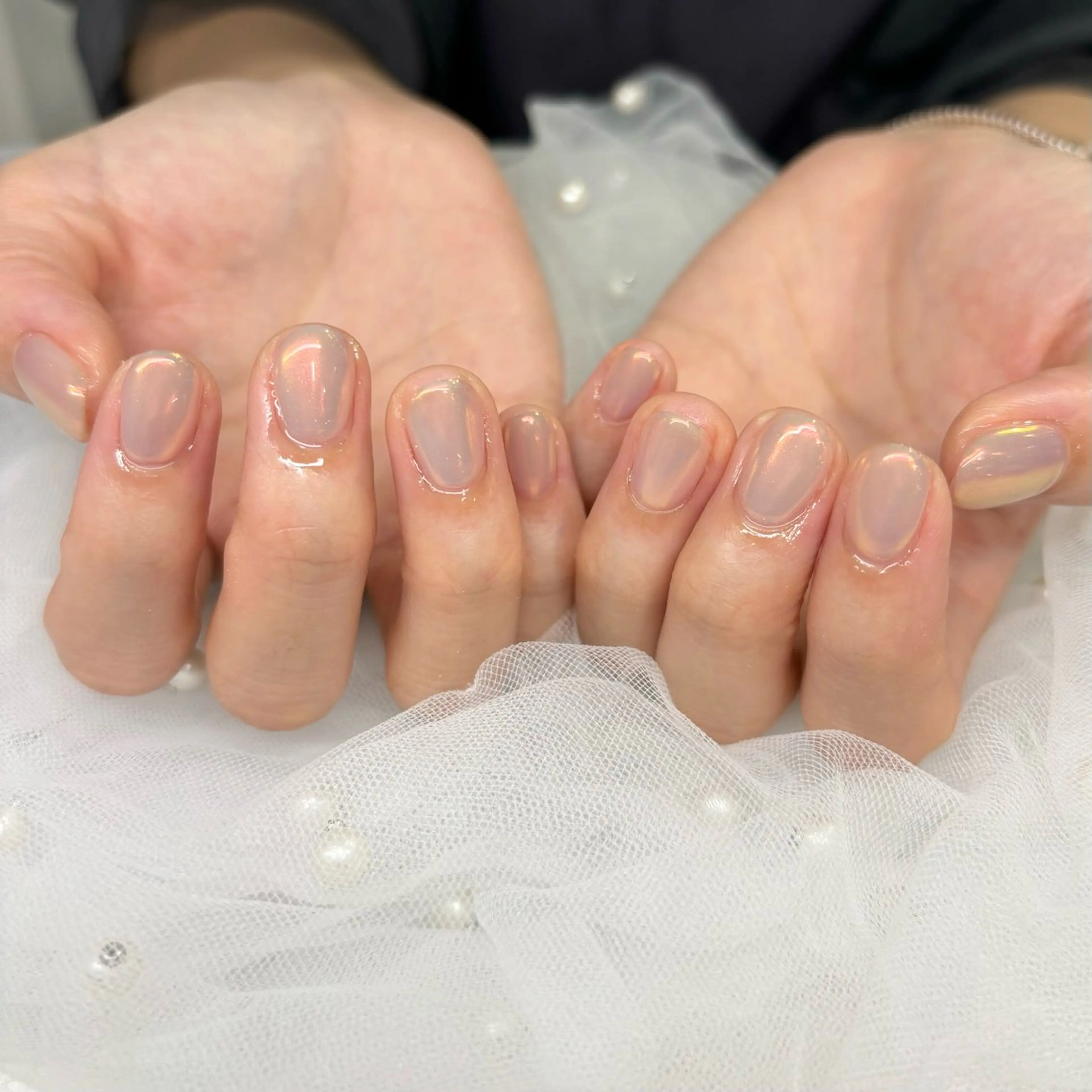 ネイル オーロラネイル オレンジ ホワイト ハンドネイル 荒巻 めいのネイルデザイン