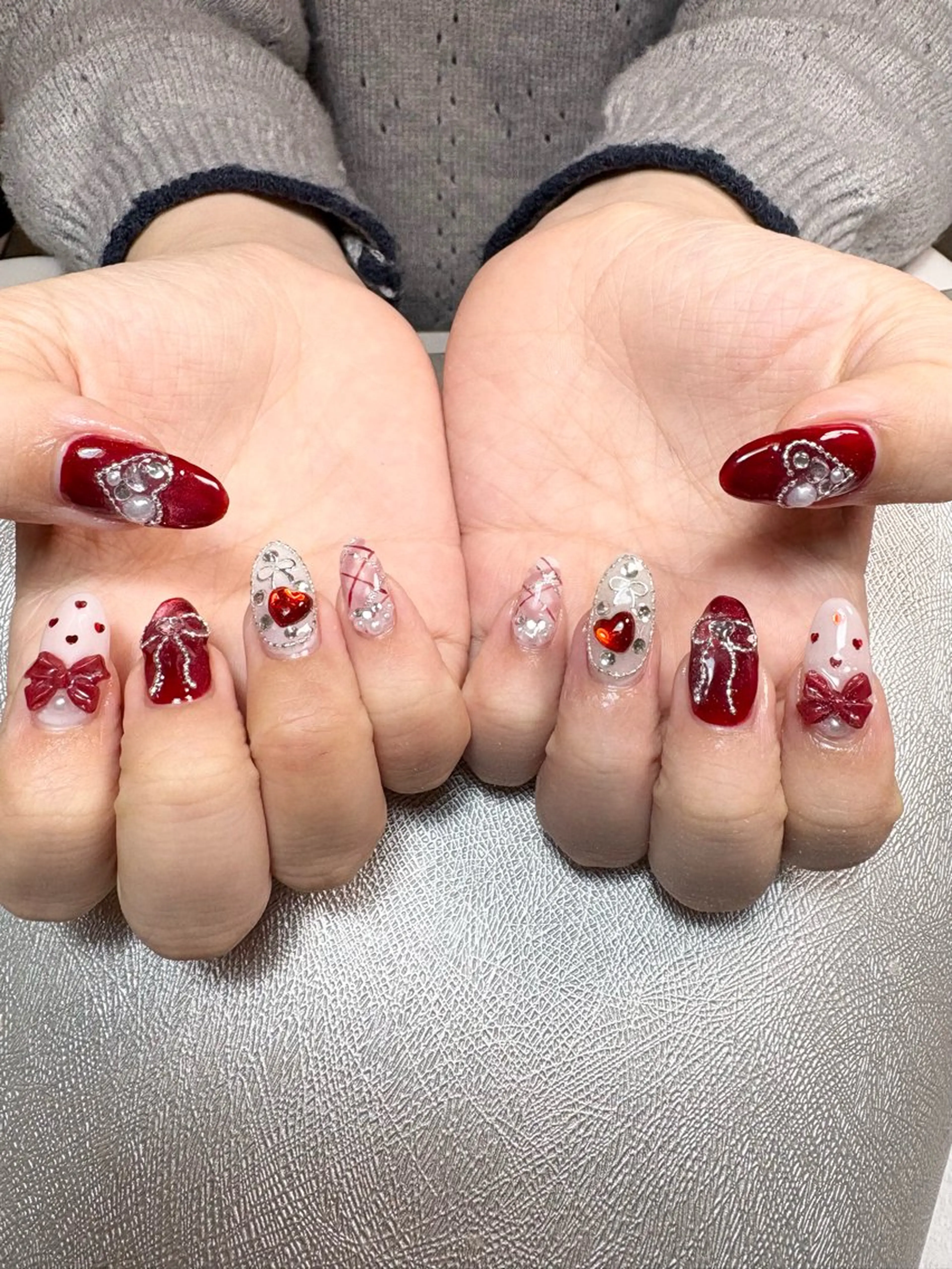 ネイル ボルドー ハート マグネットネイル 赤色 リボン ハンドネイル ✨韓国✨nail salonLumieのネイルデザイン
