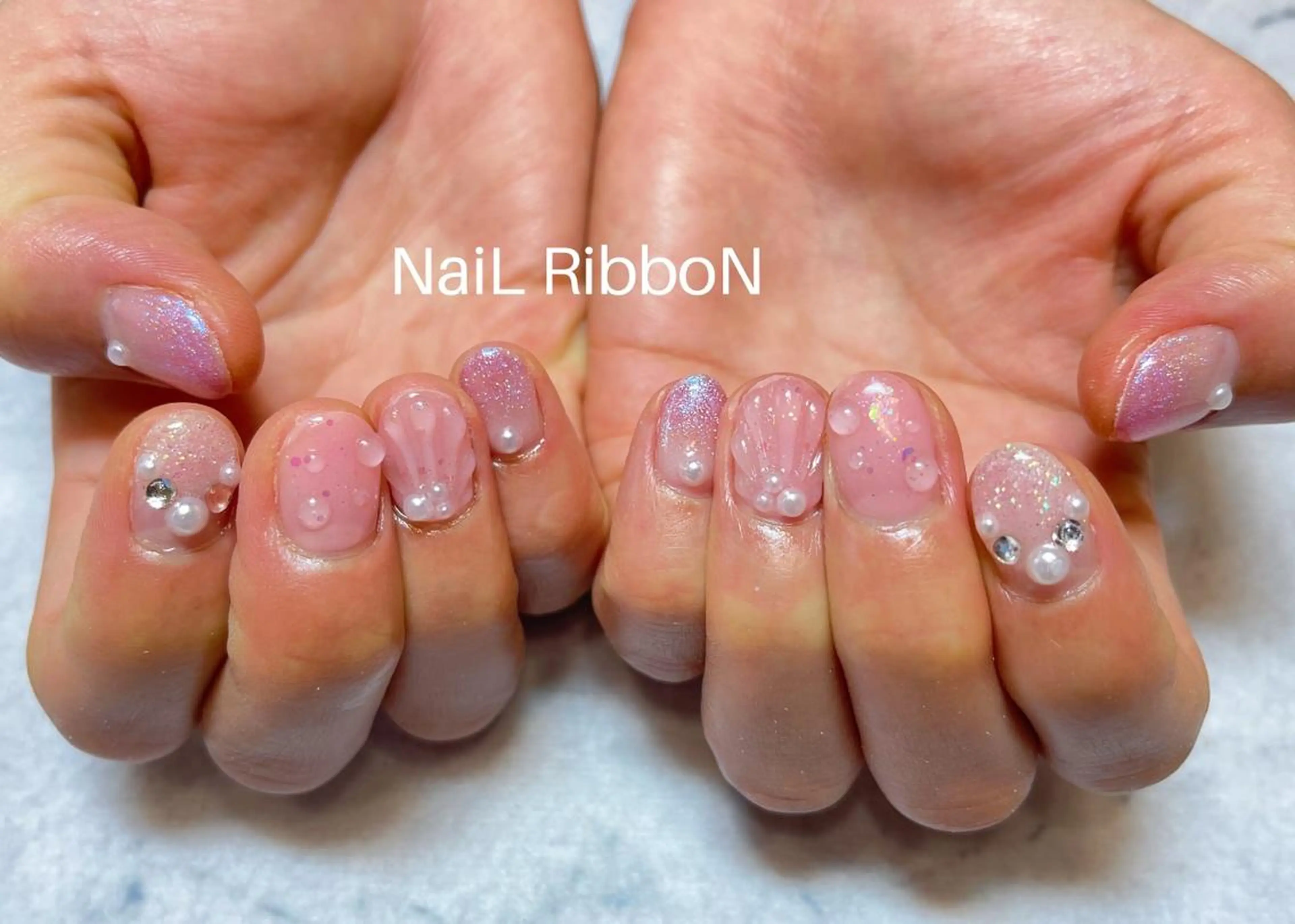 ネイル ネイルリボン 受付スタッフのネイルデザイン