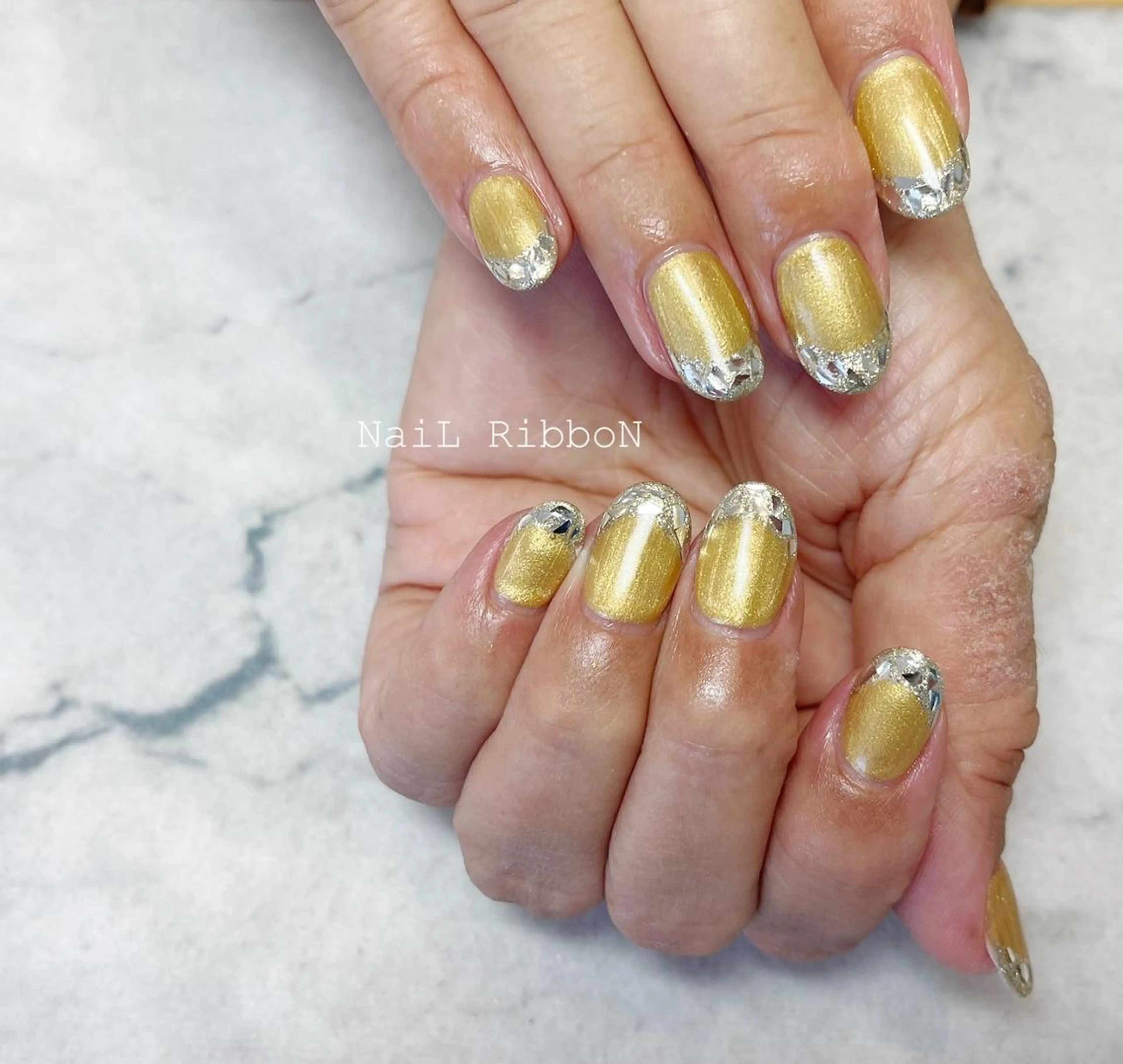 ネイル ネイルリボン 受付スタッフのネイルデザイン