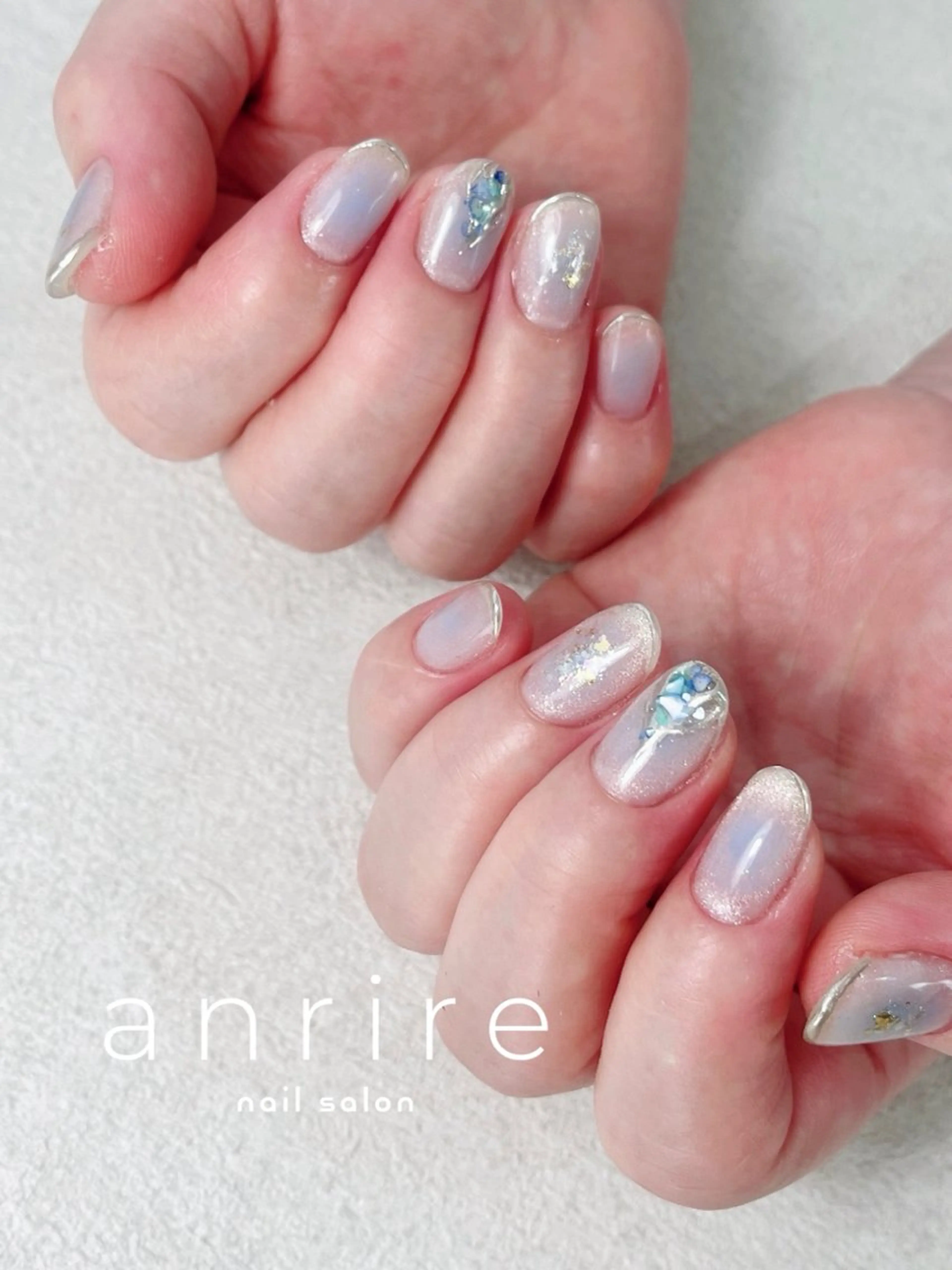 ネイル ブルー チークネイル ジェルネイル キラキラネイル ラメ(グリッター) ハンドネイル nailsalon anrireのネイルデザイン