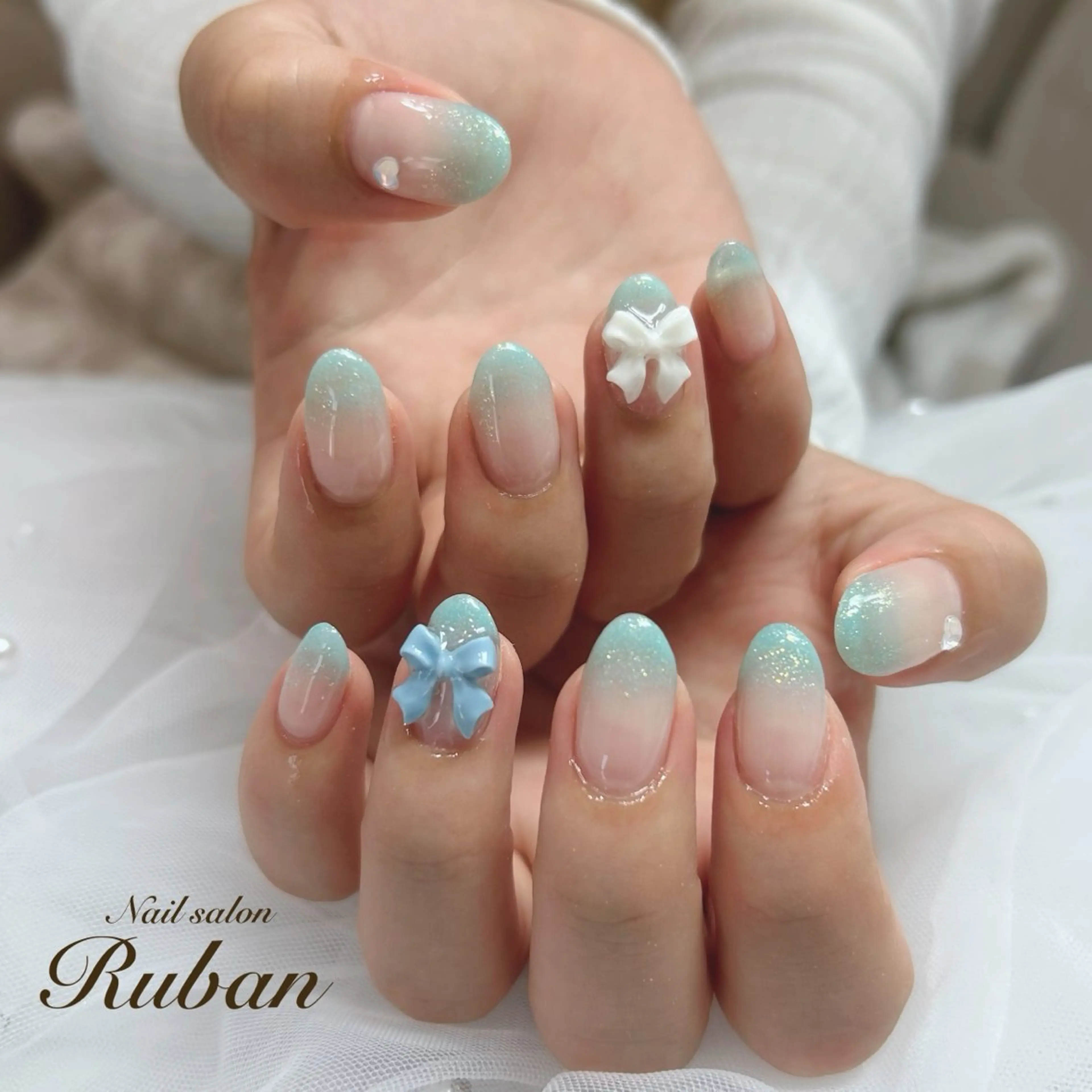 ネイル グラデーション ラメ(グリッター) ラメグラデーション リボン Nail salon Rubanのネイルデザイン