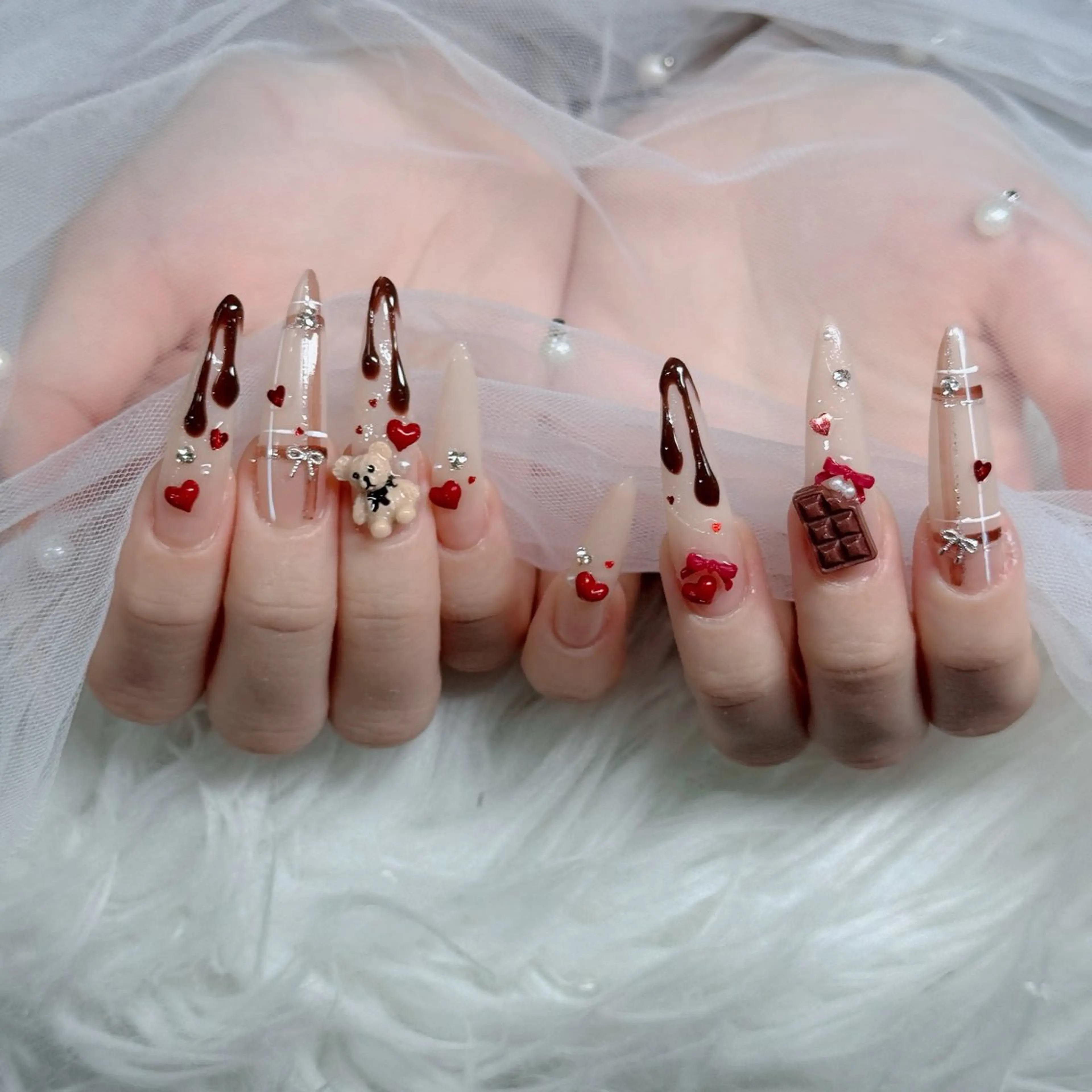 ネイル 成人式 ロングネイル マグネットネイル 大理石ネイル(マーブル) リボン ハンドネイル Hani Nail Salonのネイルデザイン