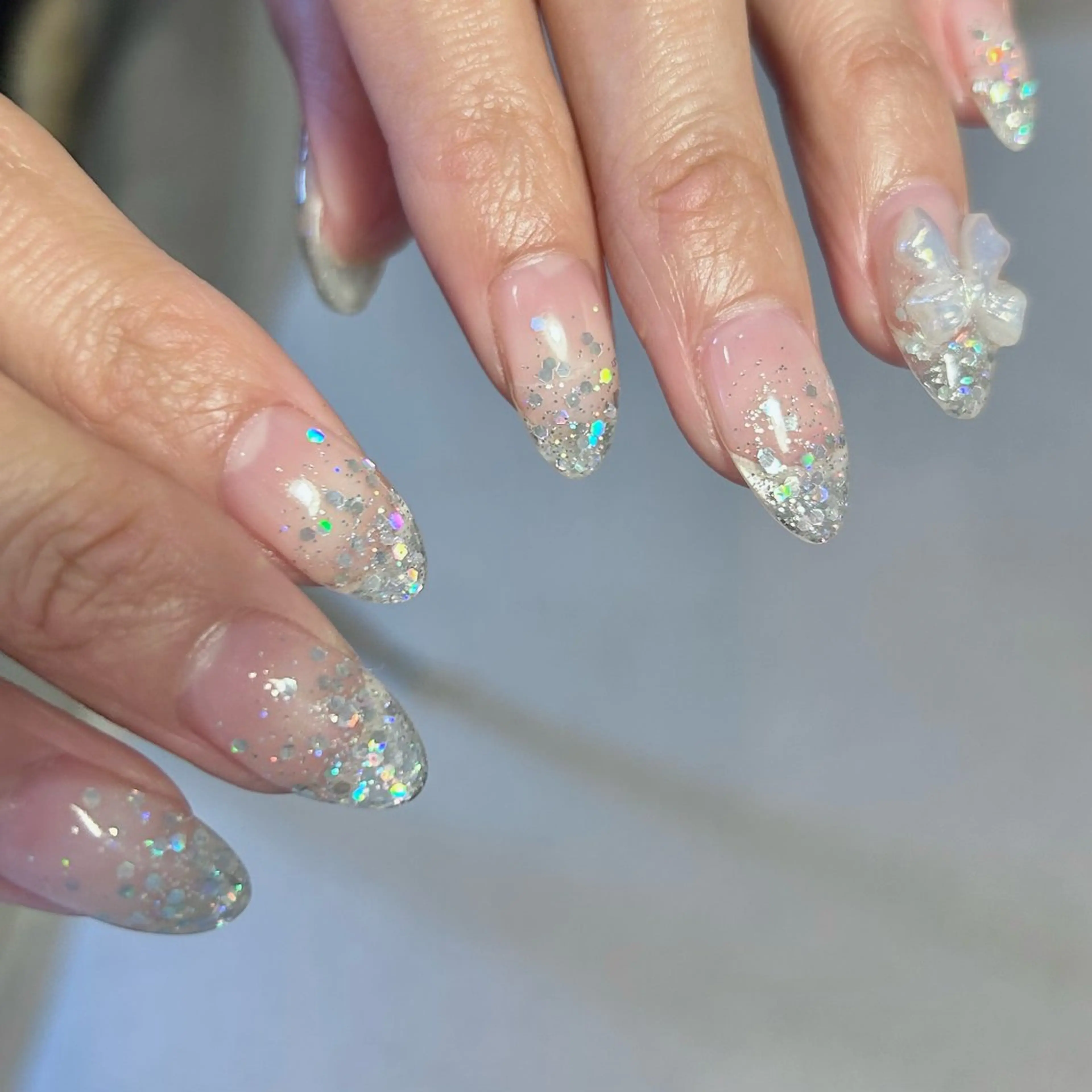 ネイル クリアネイル ハート リボン tenoteno nail/yuuriのネイルデザイン
