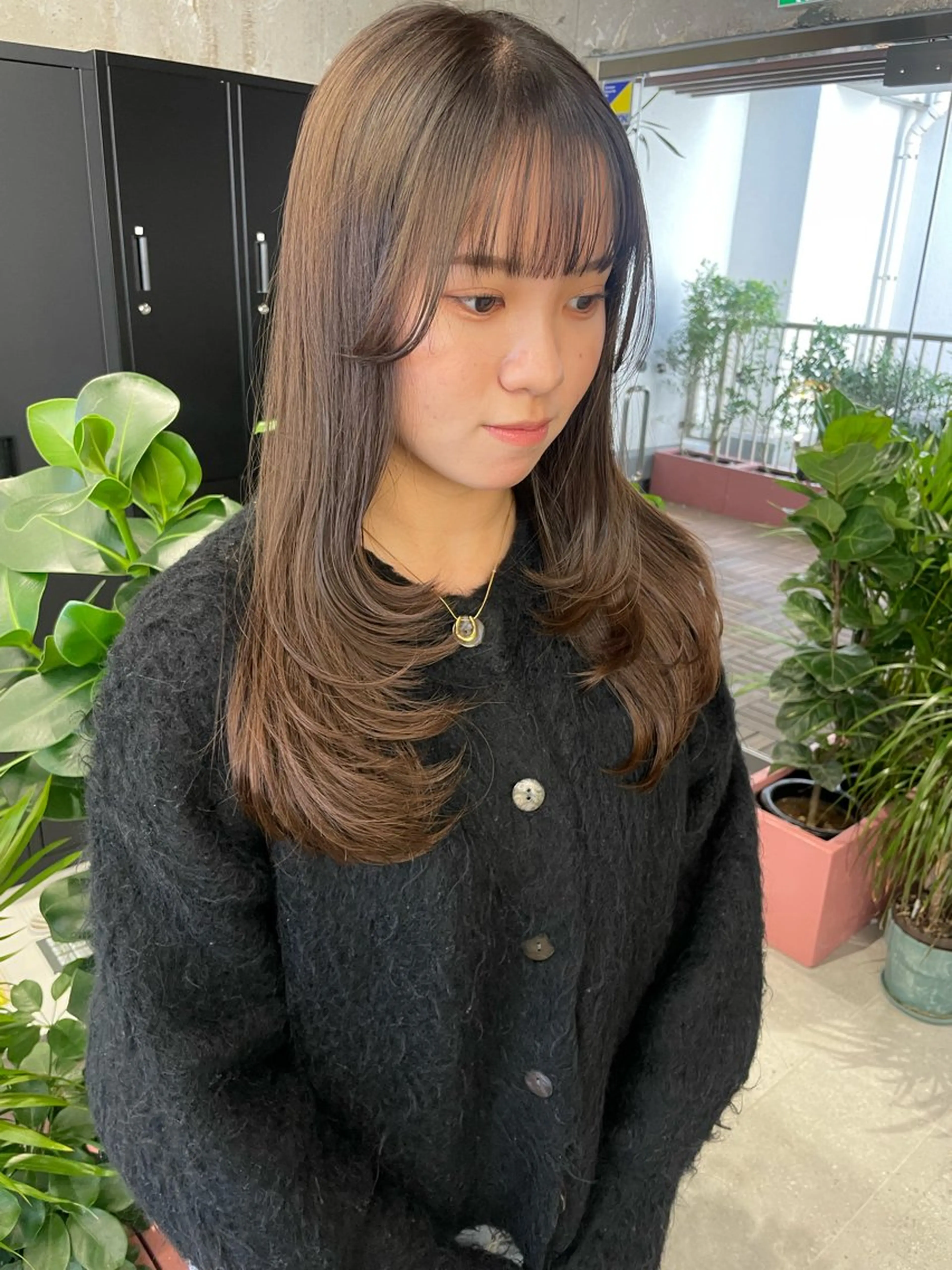 ロング MIFA レイヤー／パーマのヘアスタイル