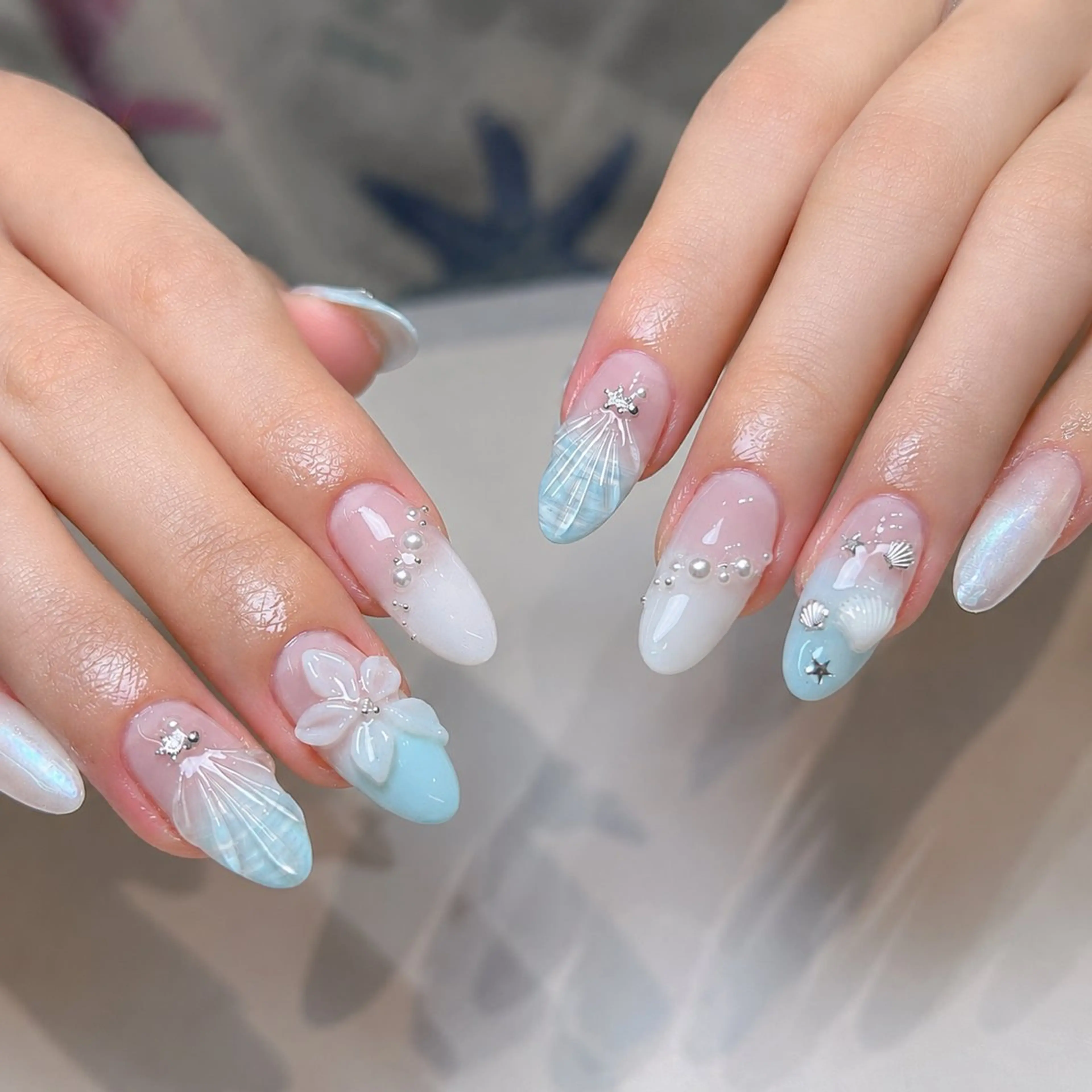 ネイル ブルー フラワーネイル 氷ネイル・うるうるネイル 韓国ネイル 持ち込み ハンドネイル Haruki Nail Salonのネイルデザイン