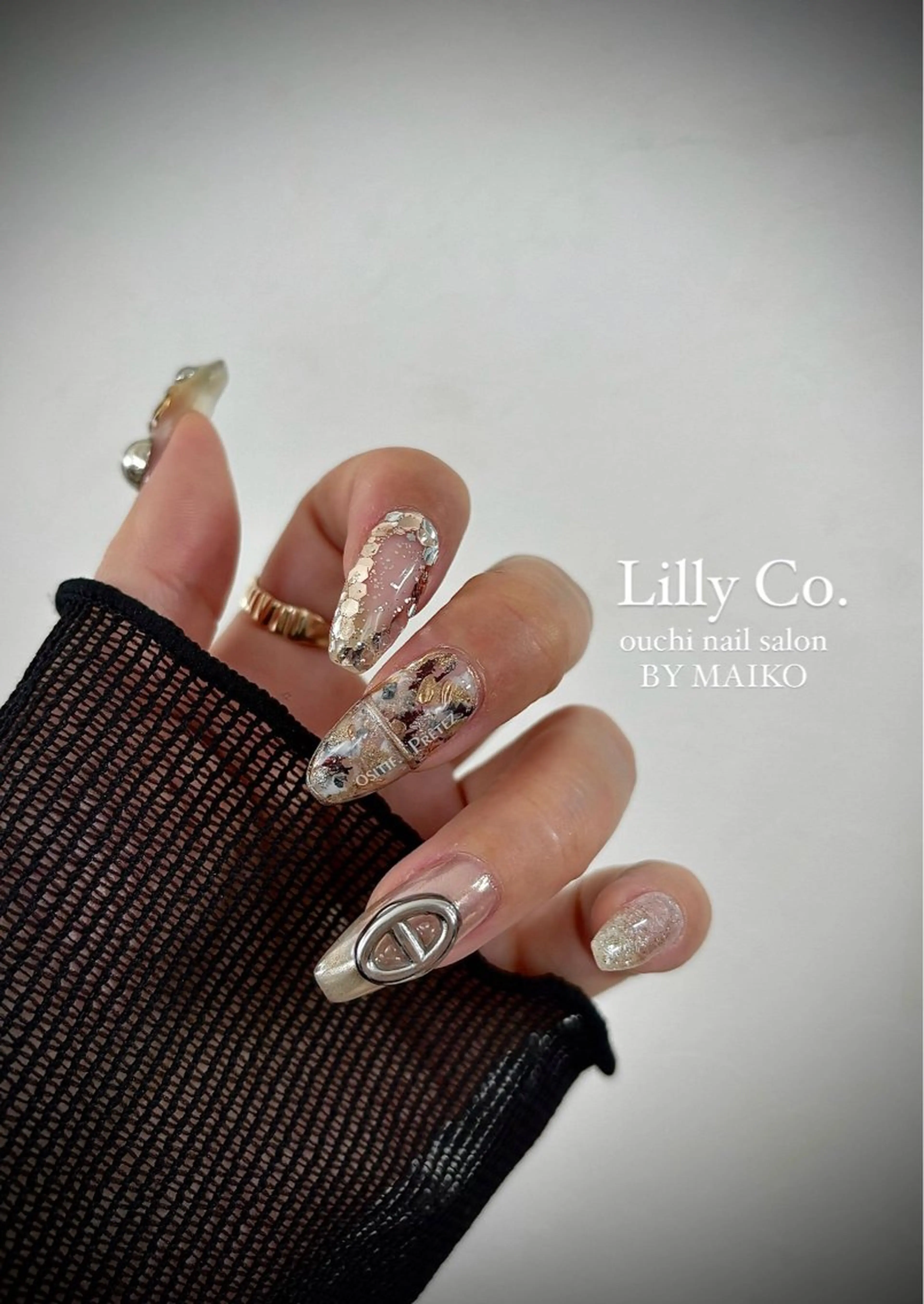 ネイル シルバー ハンドネイル ハンドケア Lilly Co.のネイルデザイン