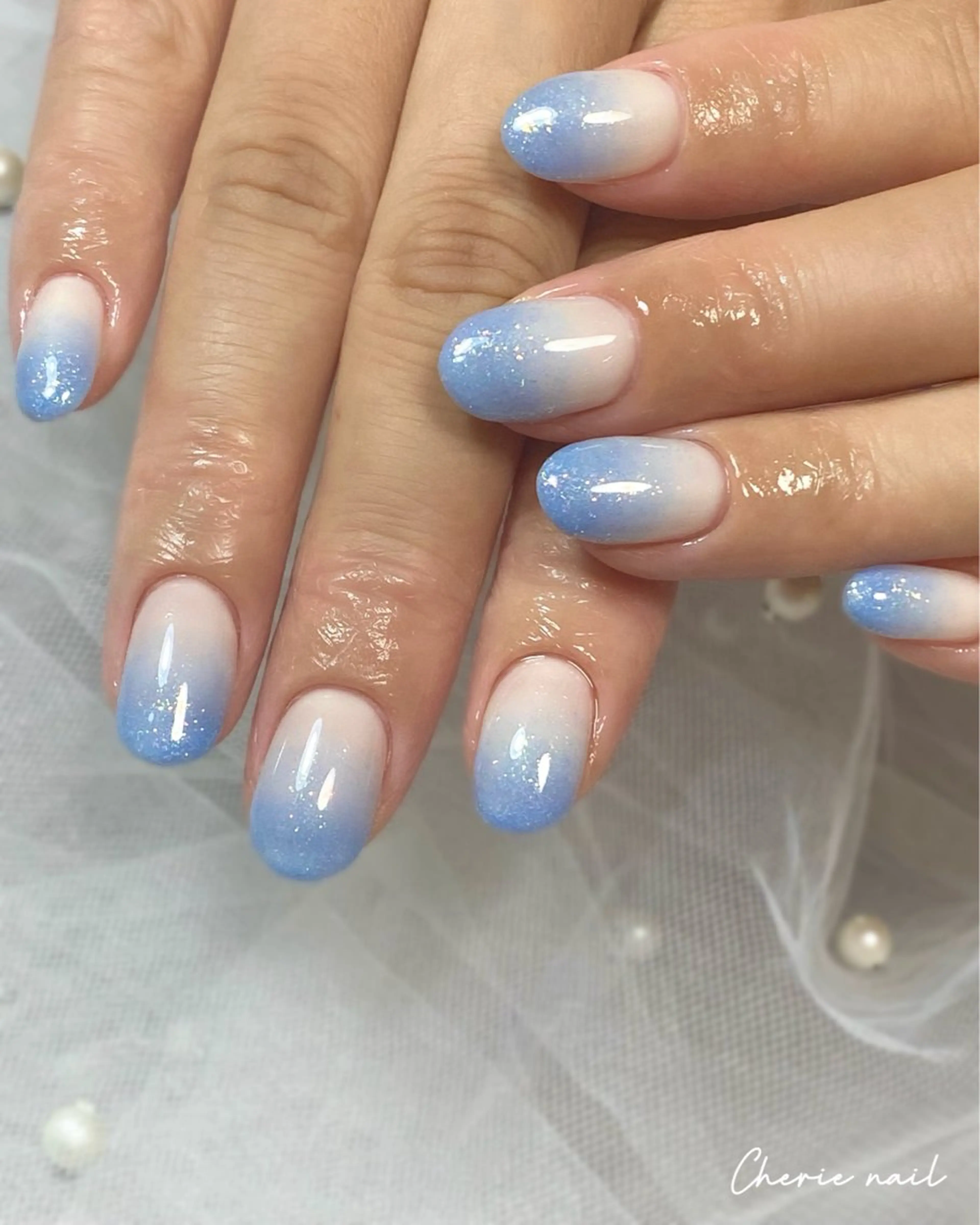 ネイル ブルー ジェルネイル グラデーション ラメ(グリッター) ラメグラデーション Cherienail yunaのネイルデザイン