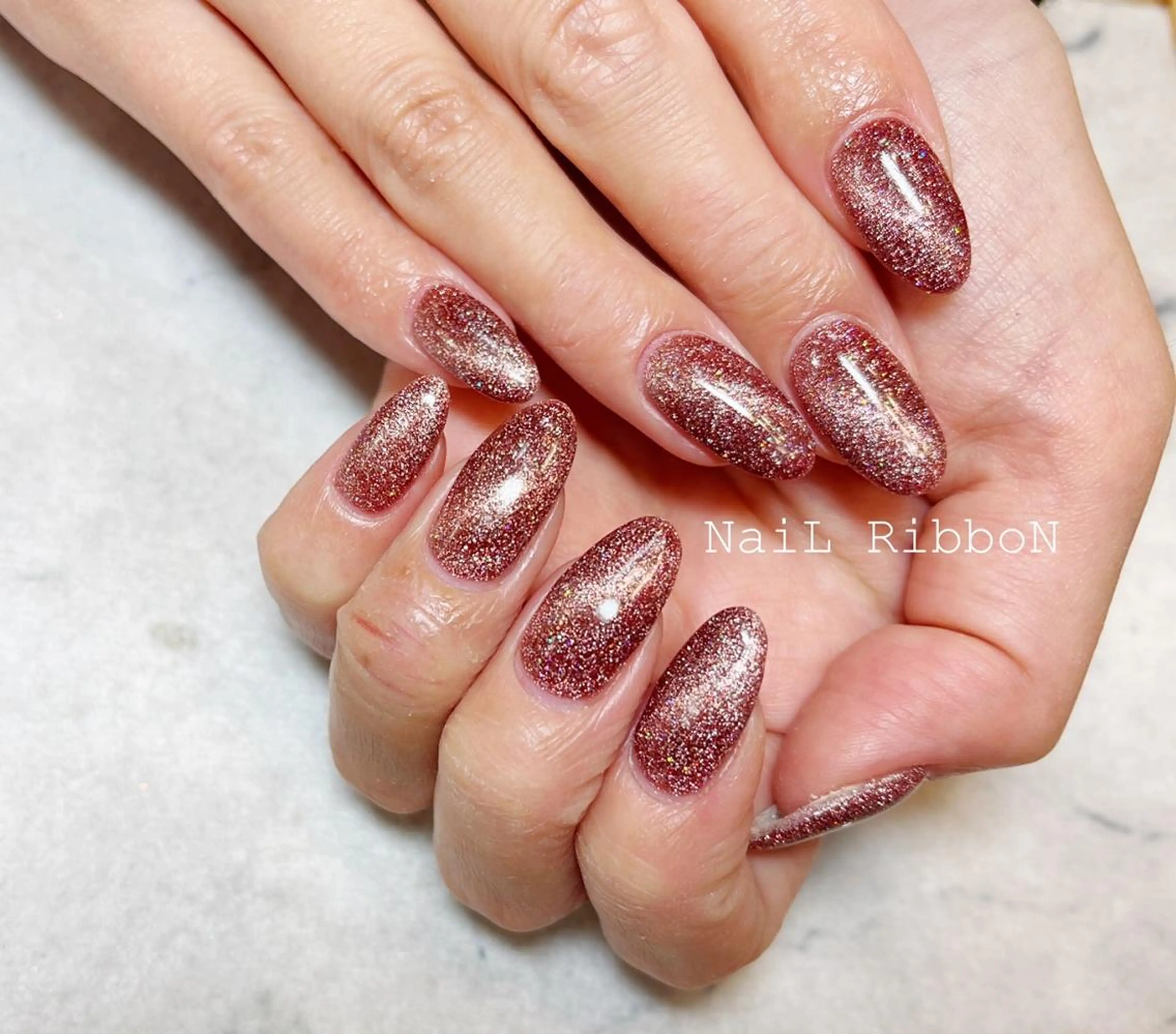 ネイル ネイルリボン 受付スタッフのネイルデザイン