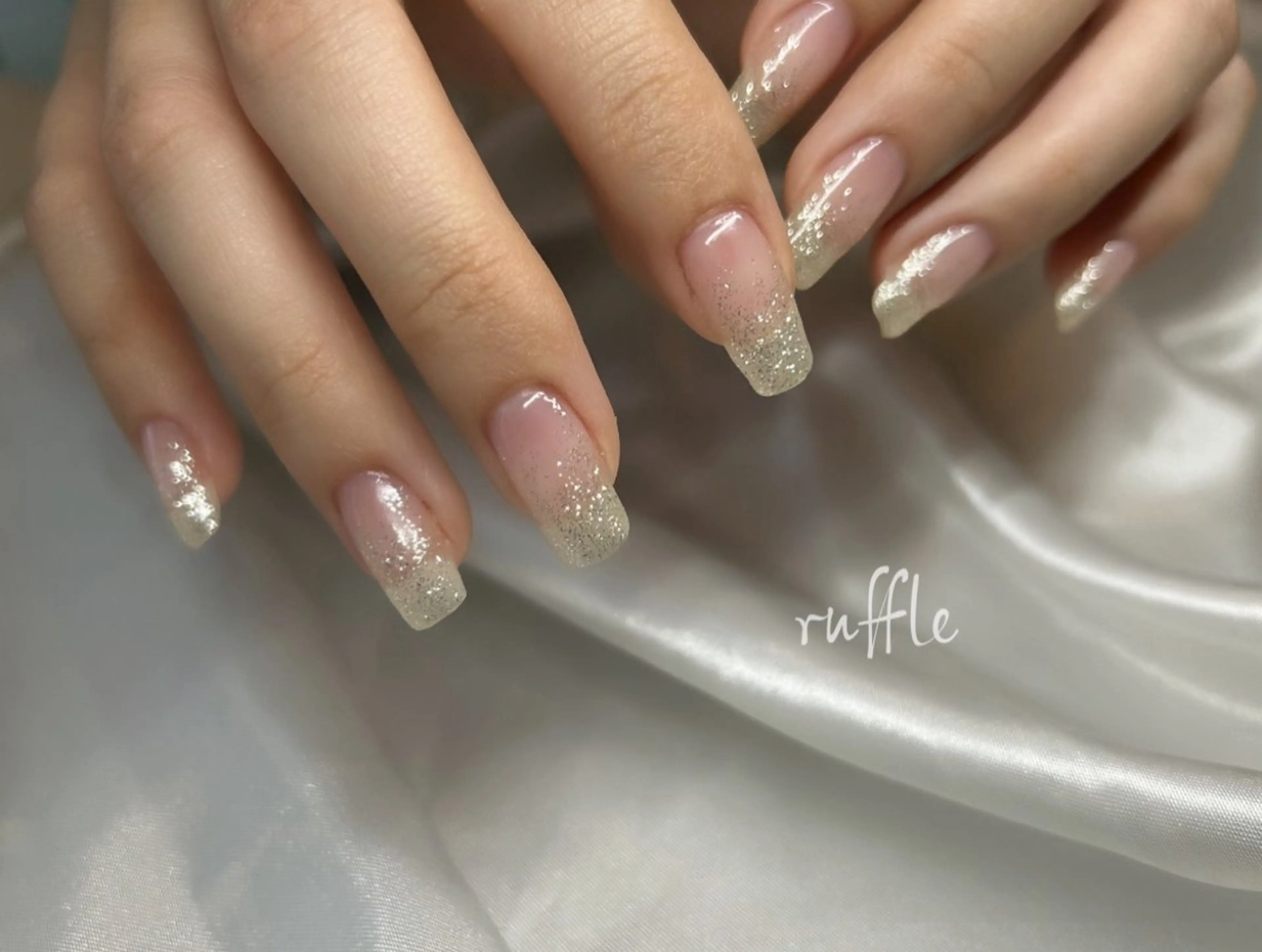 ネイル クリアネイル グラデーション ラメ(グリッター) ラメグラデーション オフィスネイル ruffle Asukaのネイルデザイン