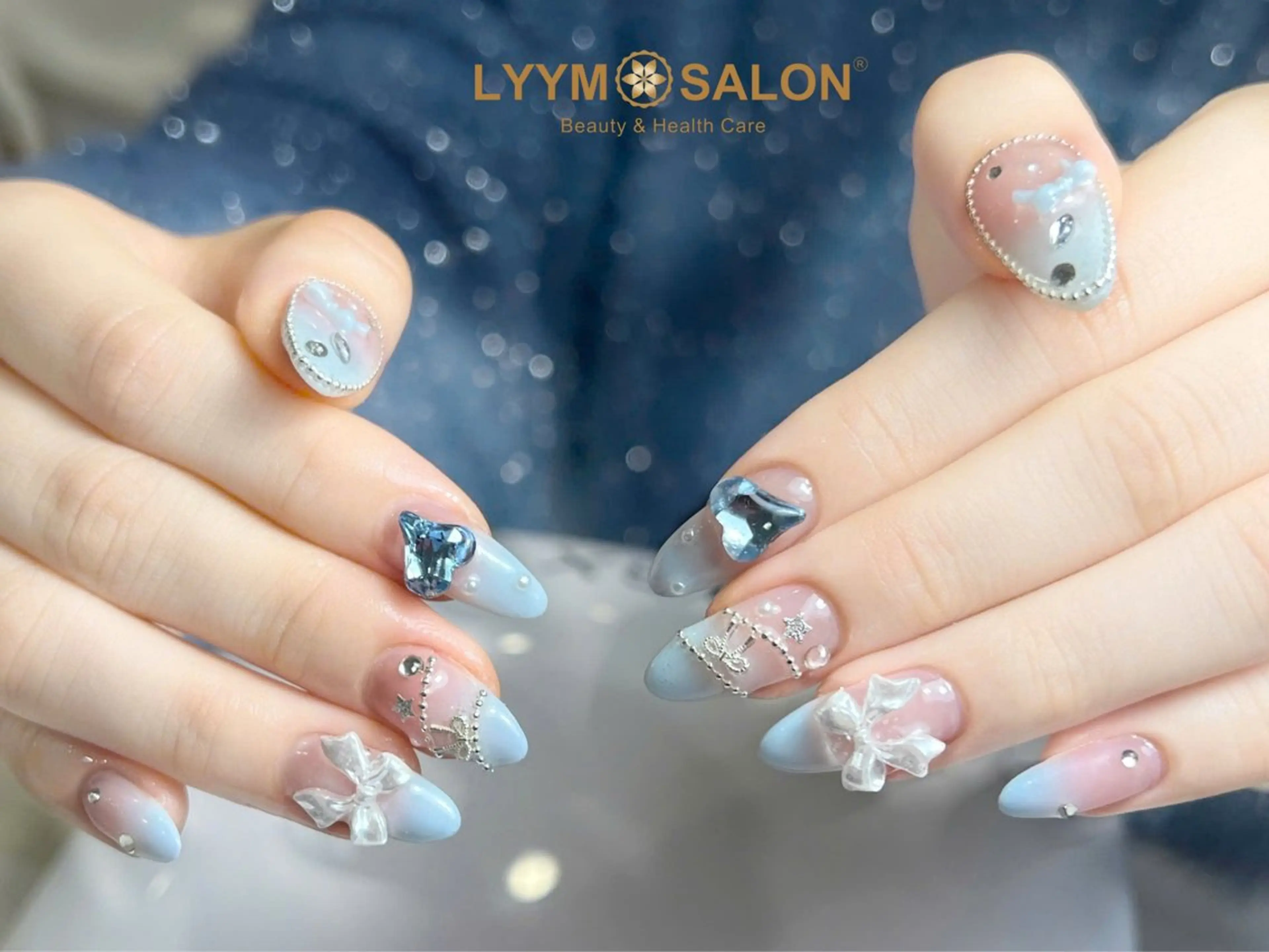 ネイル ブルー リボン ワンホンネイル ハンドネイル LYYM Salonのネイルデザイン