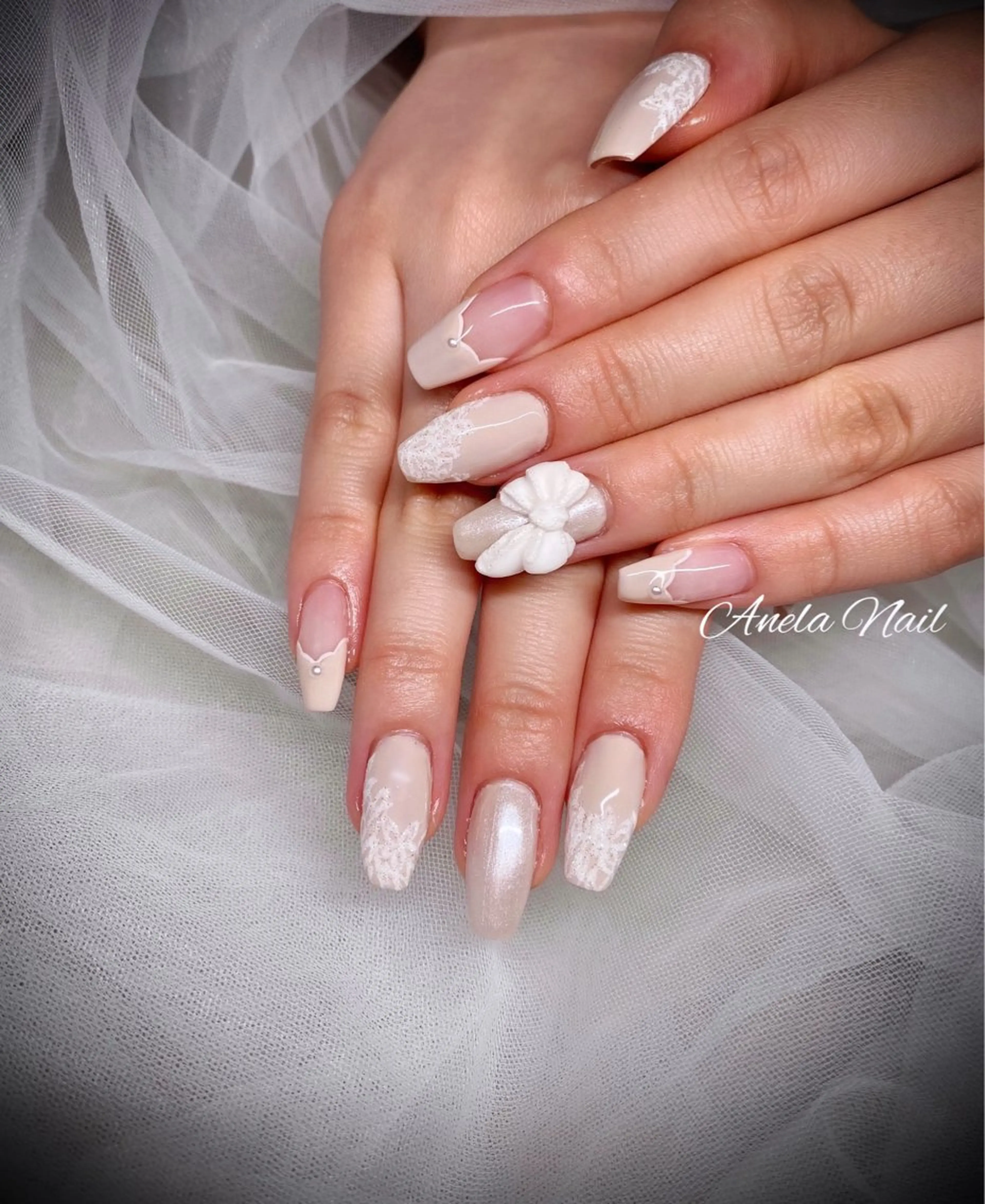 ネイル リボン ハンドネイル Anela Nailのネイルデザイン