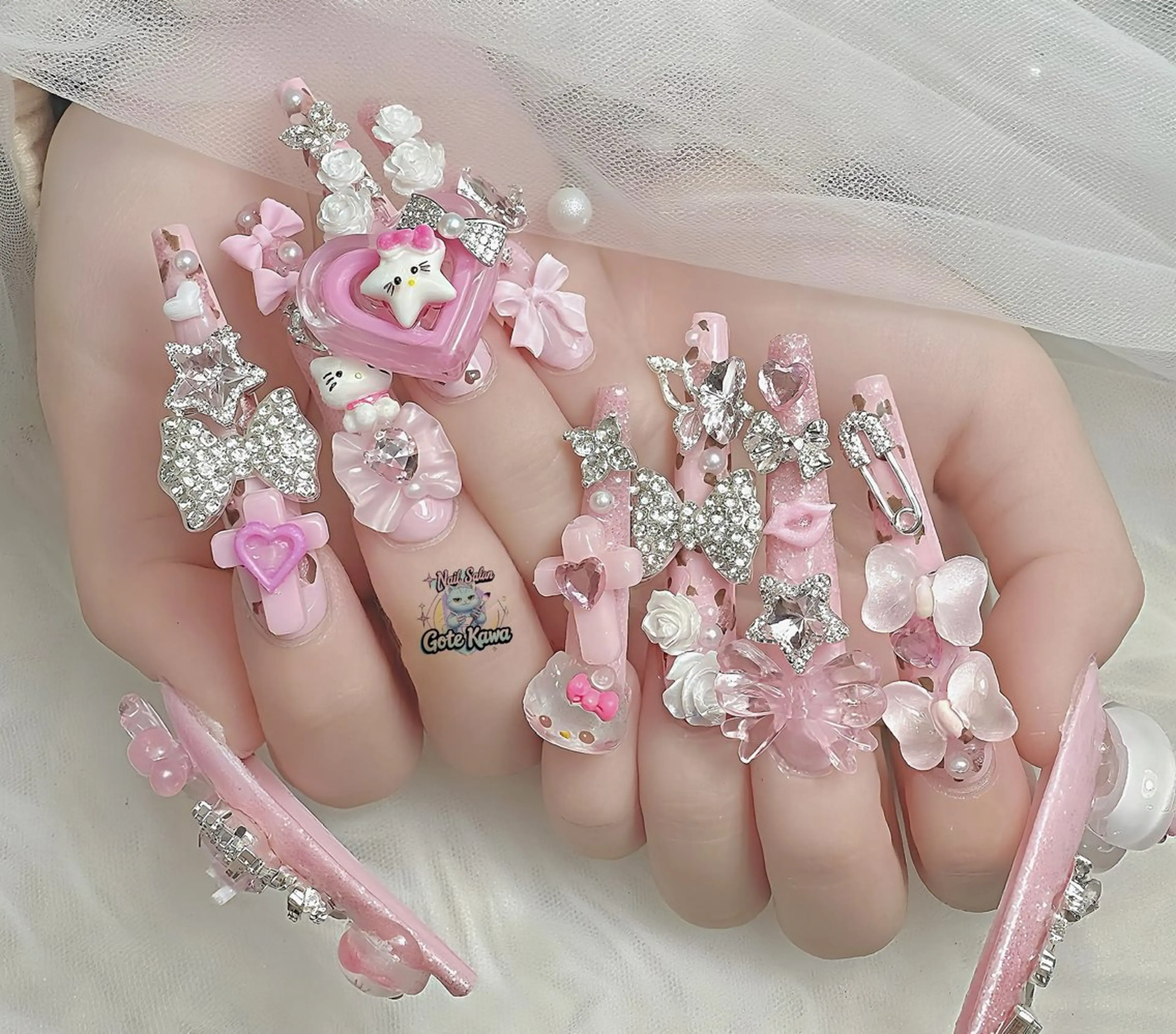 ネイル アニマル柄 ハート ロングネイル ピンク リボン ハンドネイル ハンドケア Gote Kawa nail salonのネイルデザイン