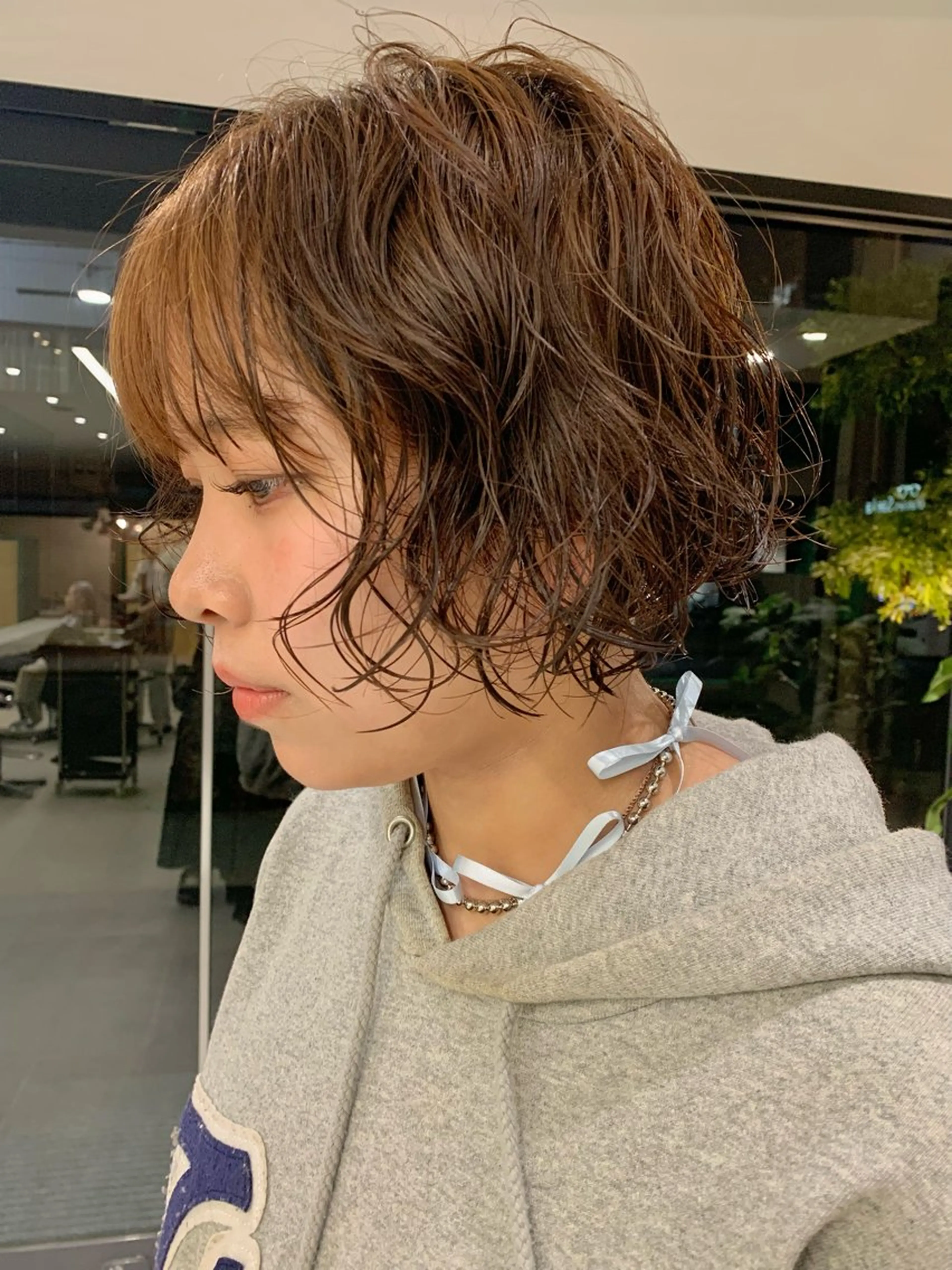 パーマ ボブ なのは\透け感カラー \レイヤーカットのヘアスタイル