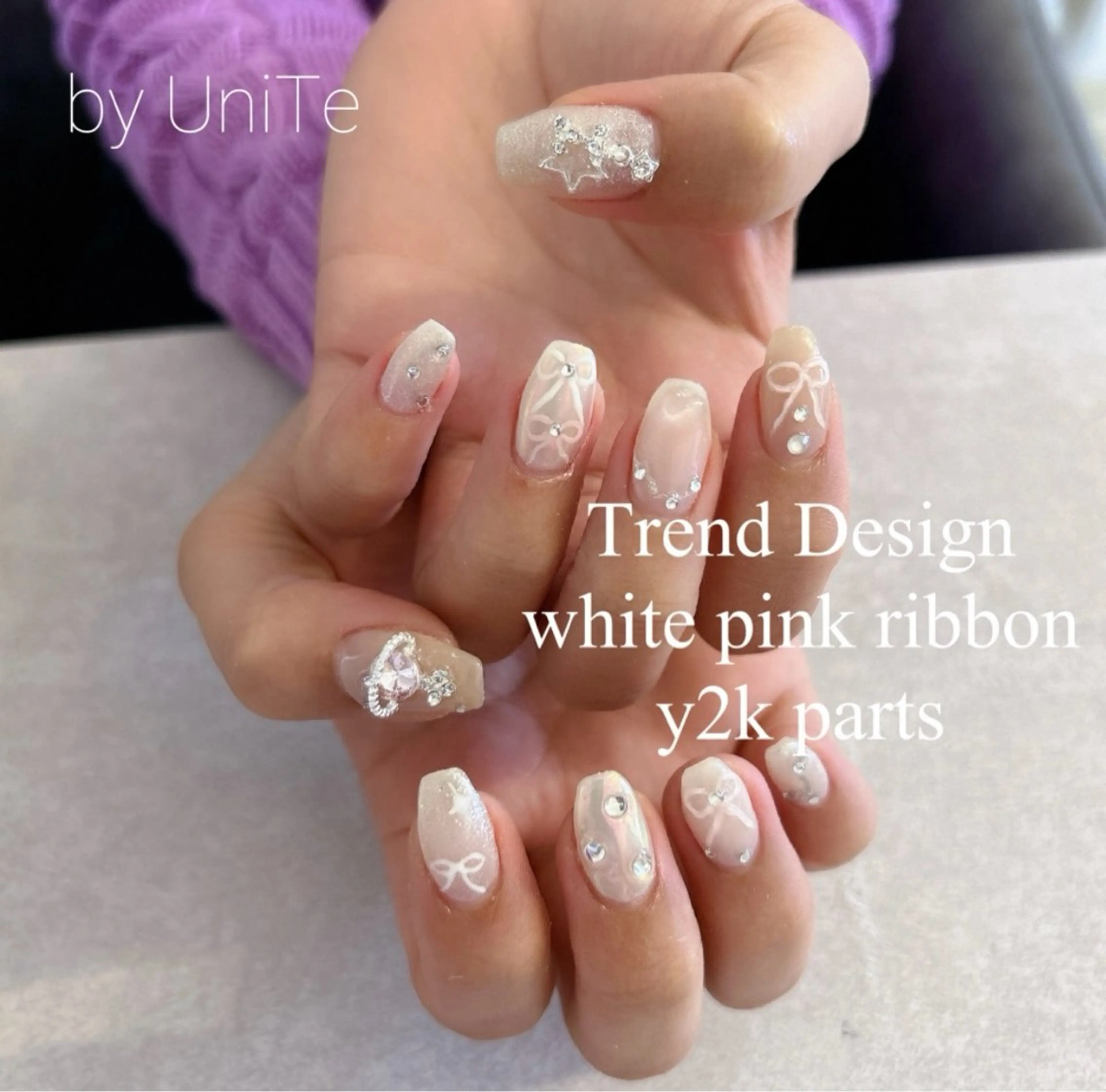 ネイル オーロラネイル 韓国ネイル リボン momoka_nails所属・Momo nailsalonのネイルデザイン