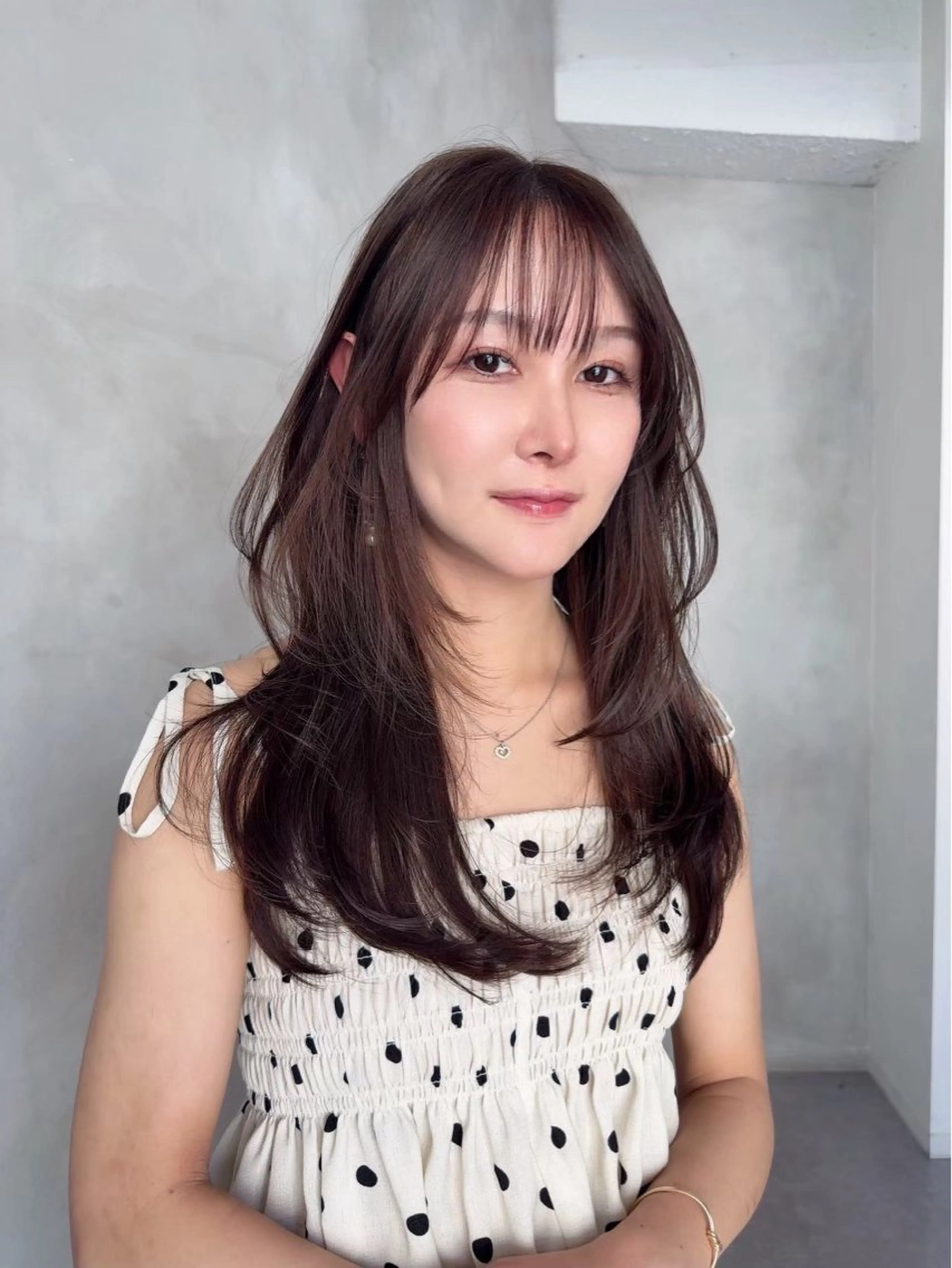 韓国風レイヤーカットモデルの写真