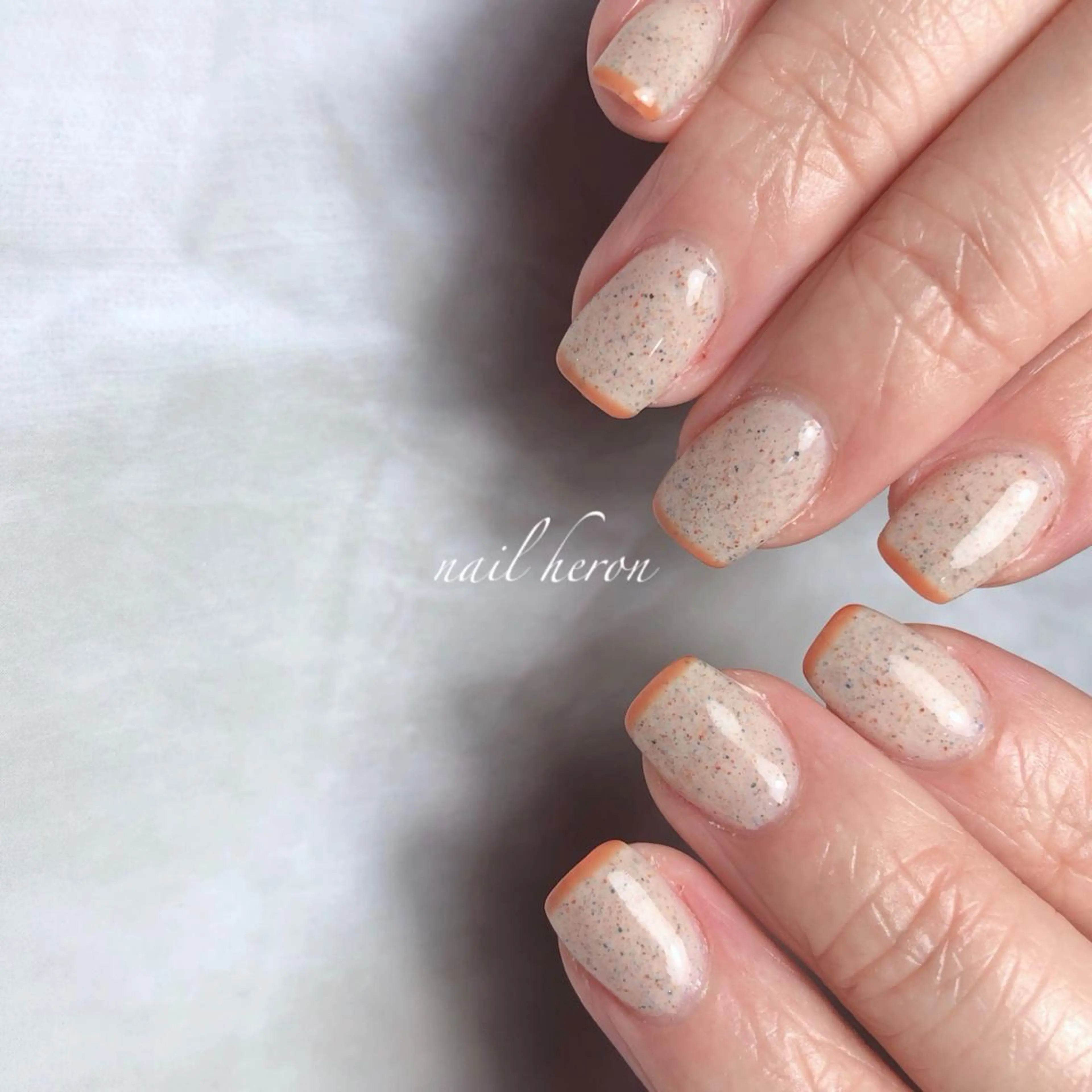ネイル オレンジ ハンドネイル saki_ nail heronのネイルデザイン
